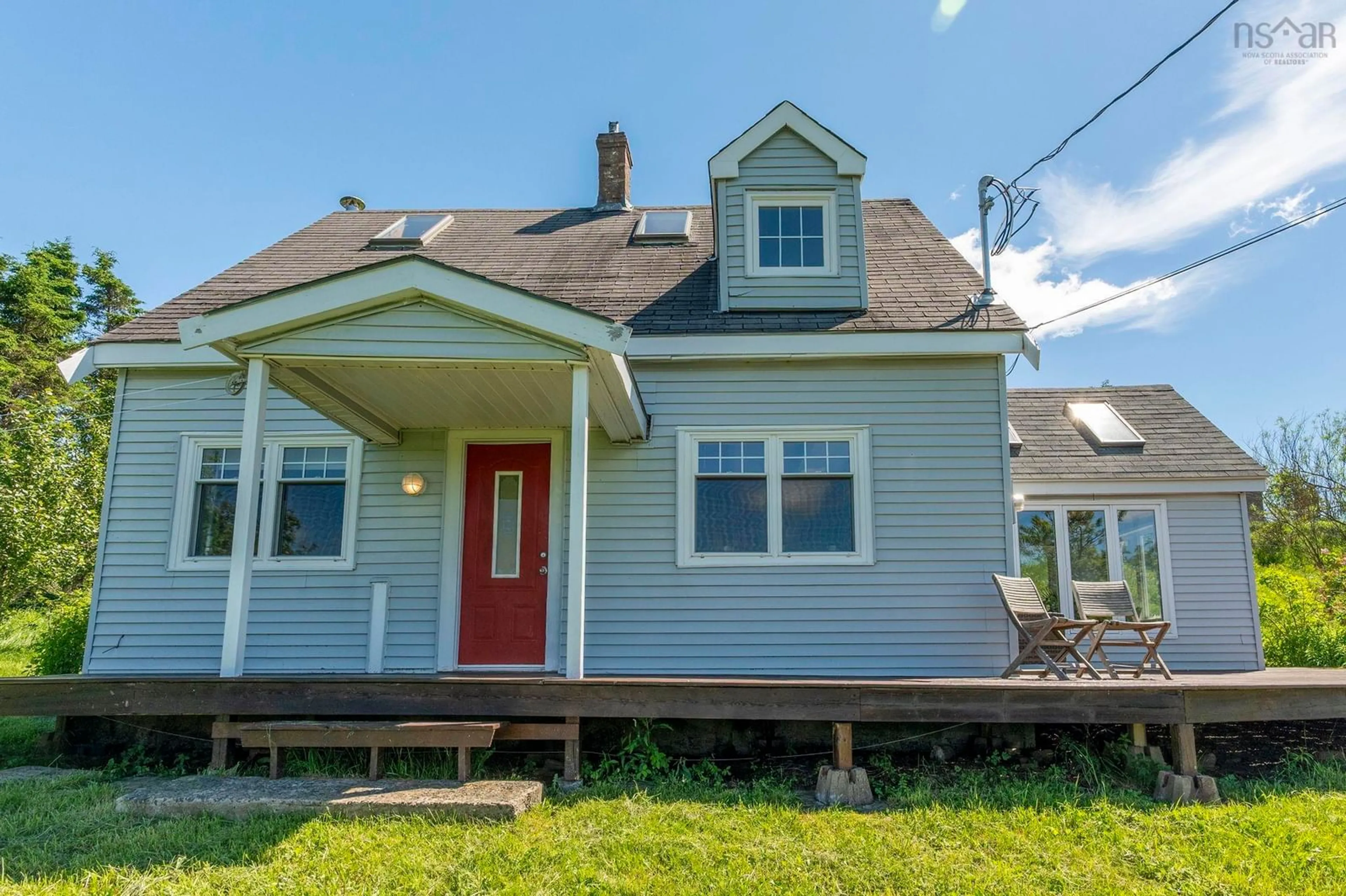 Home with vinyl exterior material, street for 6176 Highway 207, Seaforth Nova Scotia B0J 2L0