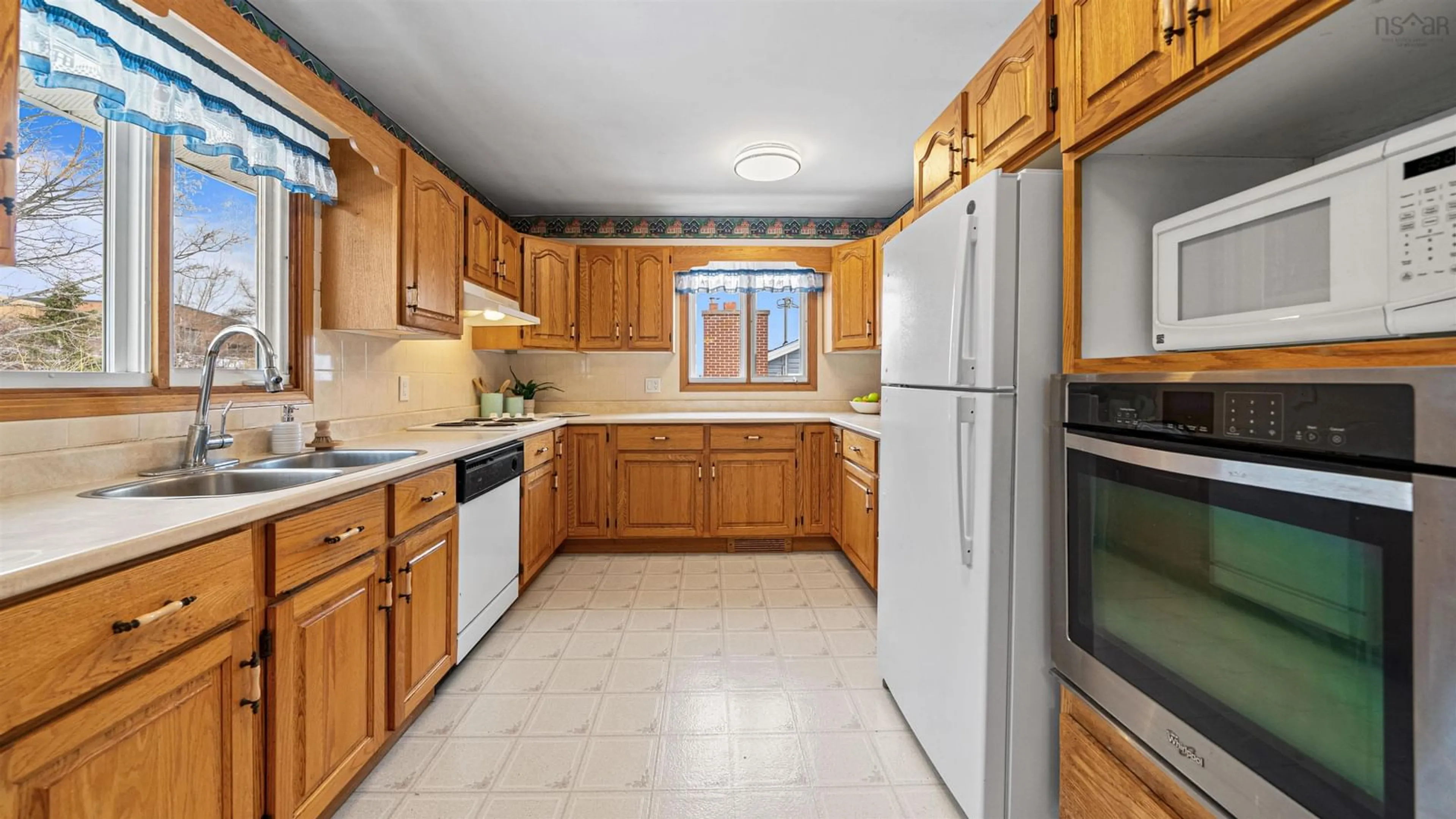 Standard kitchen, ceramic/tile floor for 57 Tartan Ave, Spryfield Nova Scotia B3R 2B7
