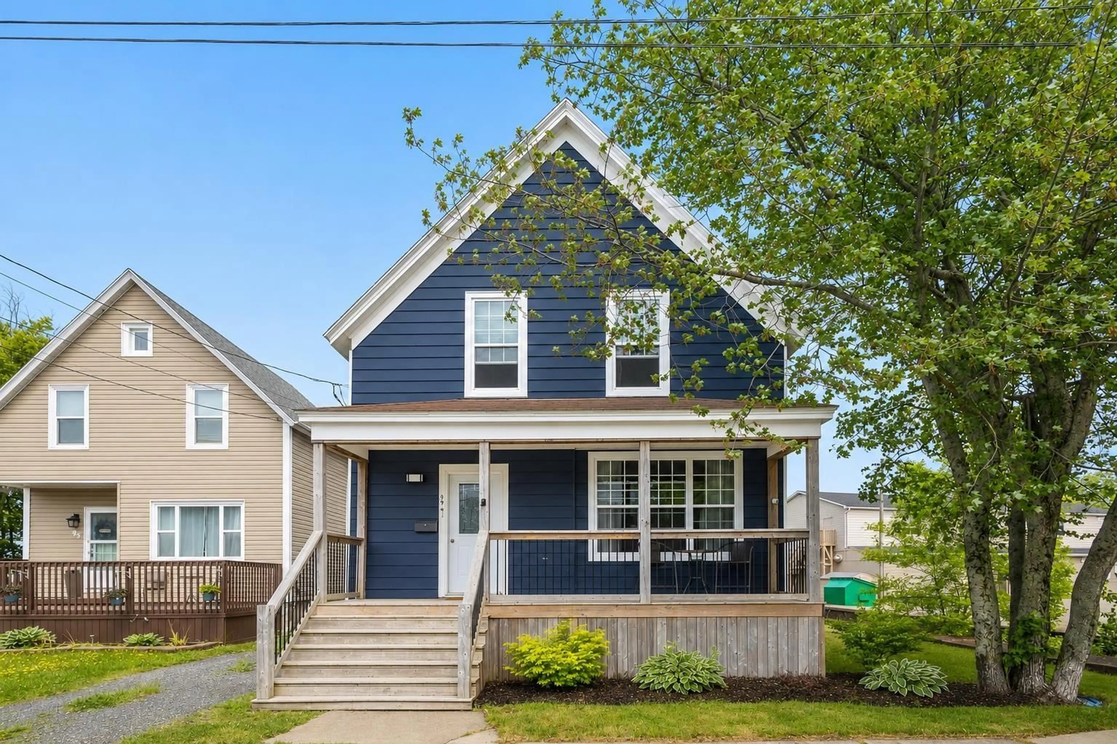 Home with vinyl exterior material, street for 99 Brookland St, Sydney Nova Scotia B1P 5B3