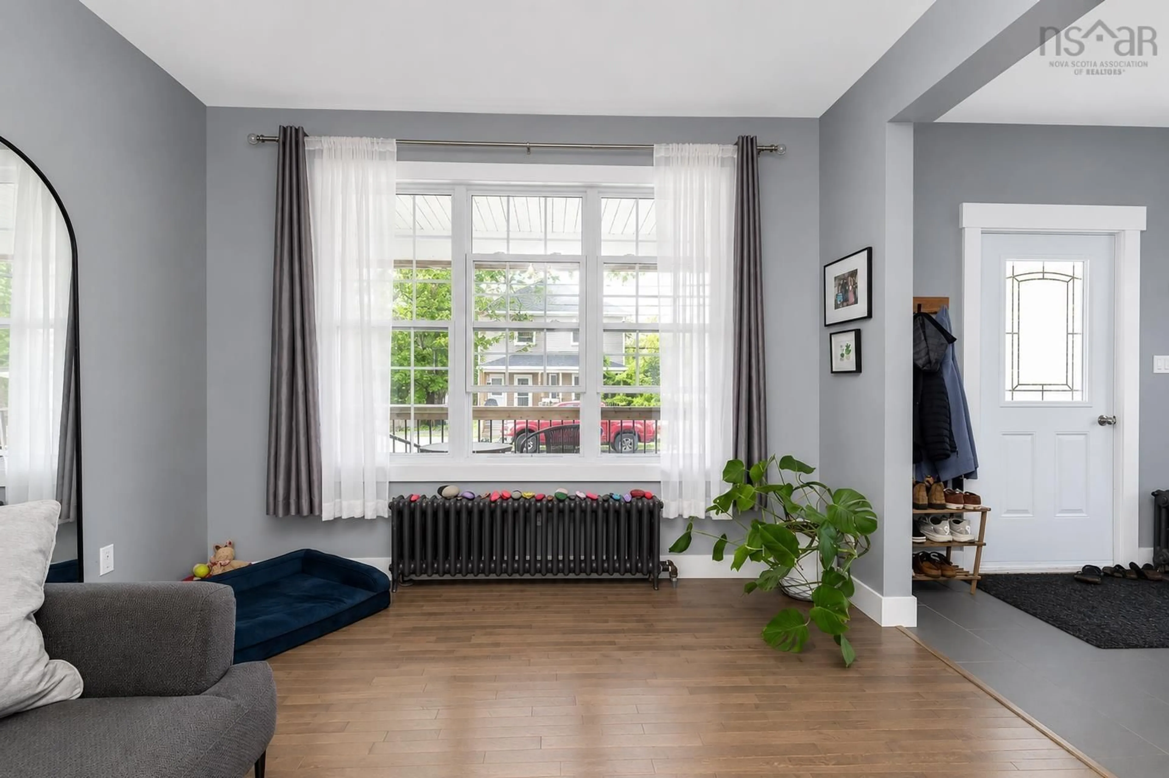 Living room with furniture, unknown for 99 Brookland St, Sydney Nova Scotia B1P 5B3