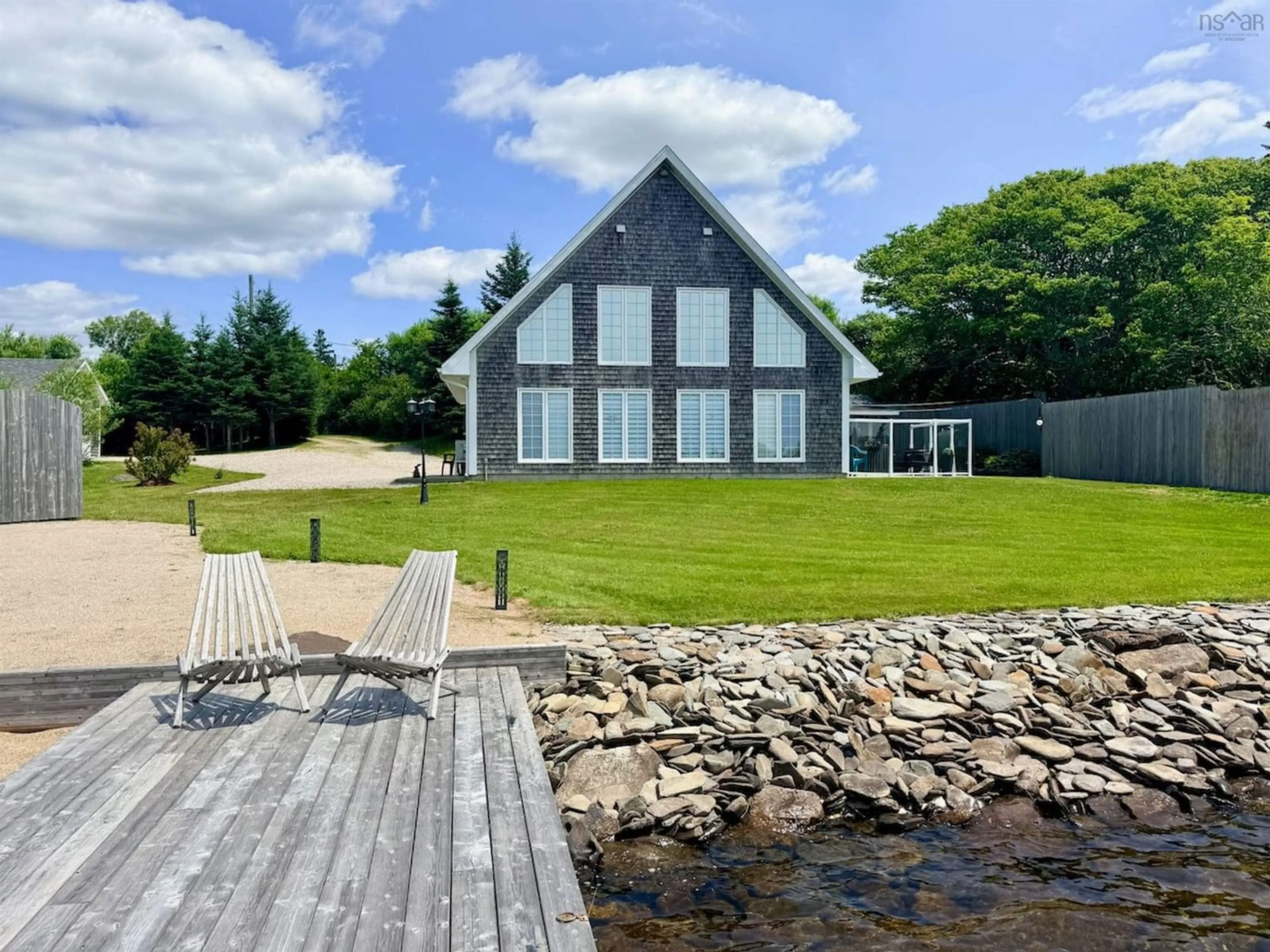 A pic from outside/outdoor area/front of a property/back of a property/a pic from drone, water/lake/river/ocean view for 65 Tom's Way, Darlings Lake Nova Scotia B5A 5A8