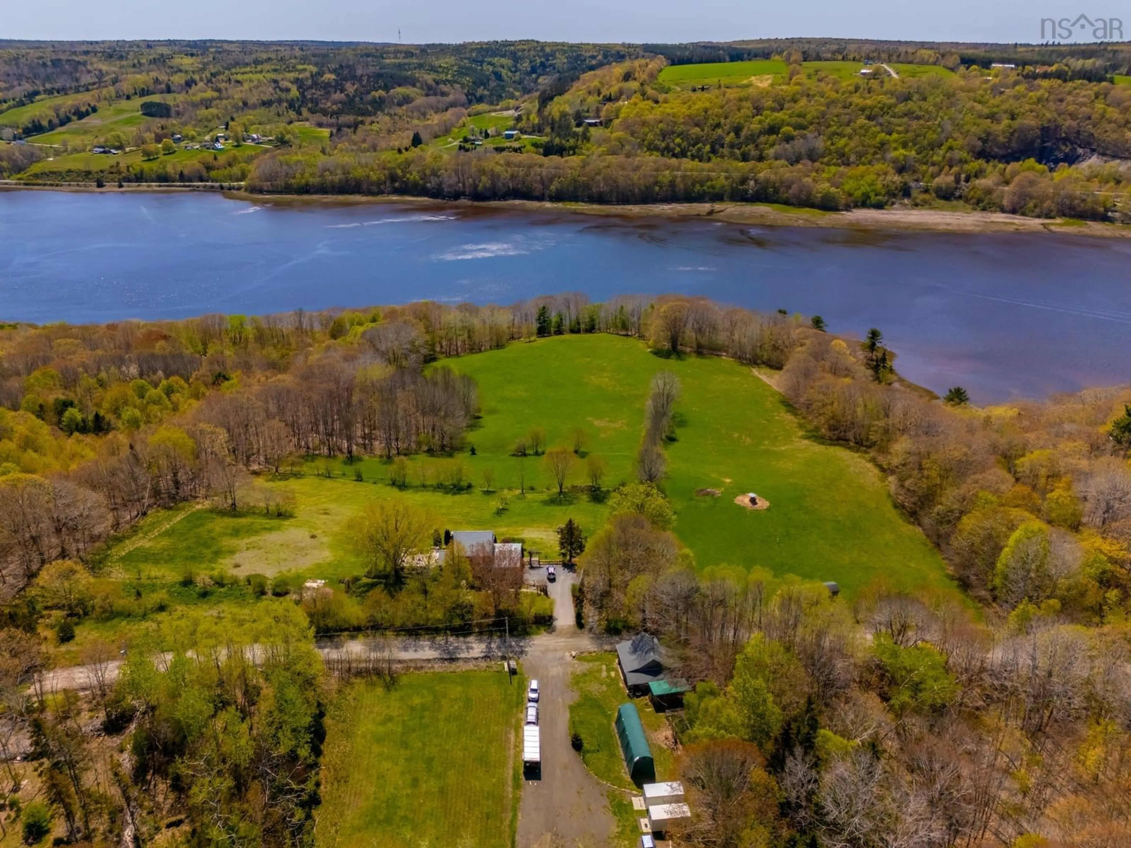 A pic from outside/outdoor area/front of a property/back of a property/a pic from drone, water/lake/river/ocean view for 481 Chute Rd, Bear River Nova Scotia B0S 1B0