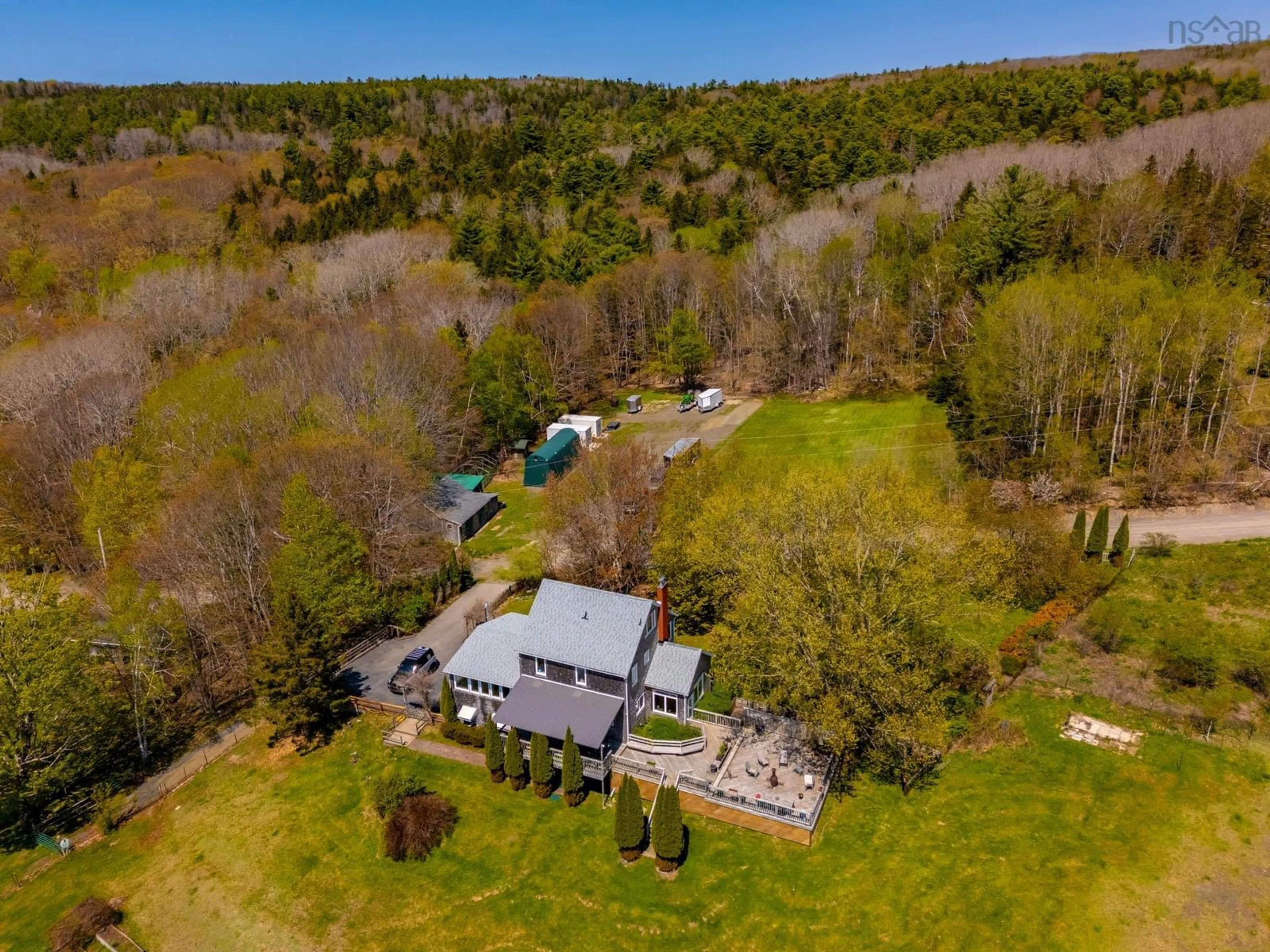 A pic from outside/outdoor area/front of a property/back of a property/a pic from drone, water/lake/river/ocean view for 481 Chute Rd, Bear River Nova Scotia B0S 1B0