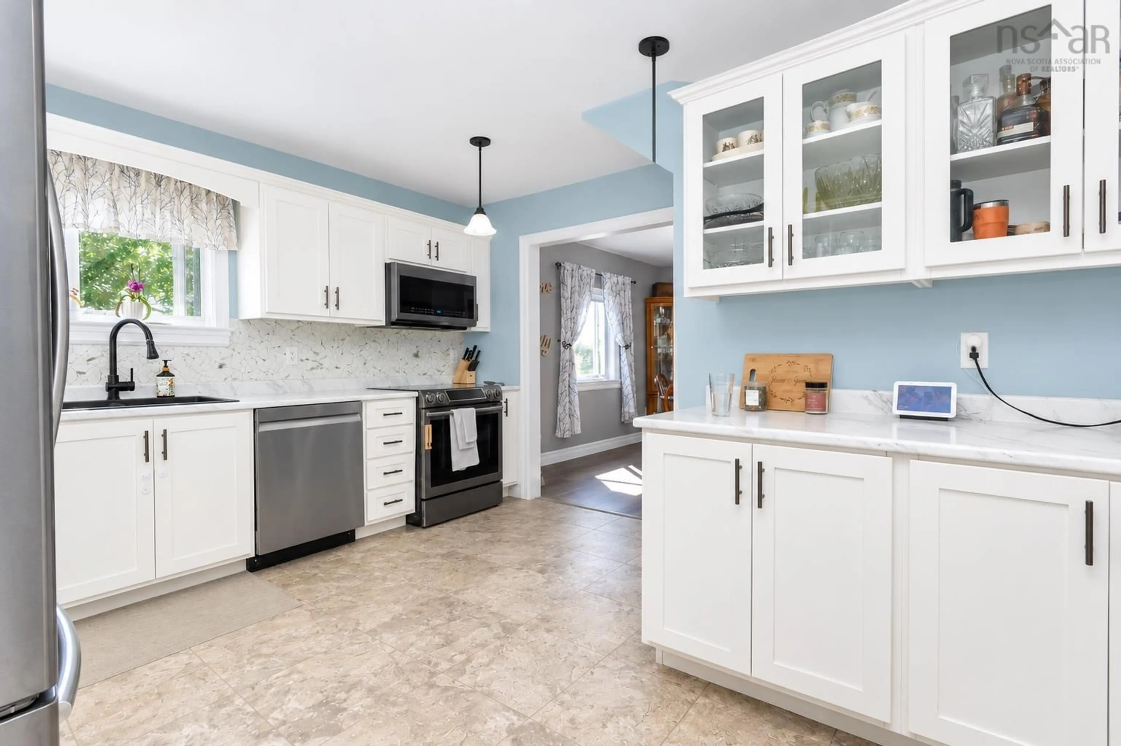 Open concept kitchen, ceramic/tile floor for 1851 Old Route 5 Hwy, Big Bras D'Or Nova Scotia B1X 1A5