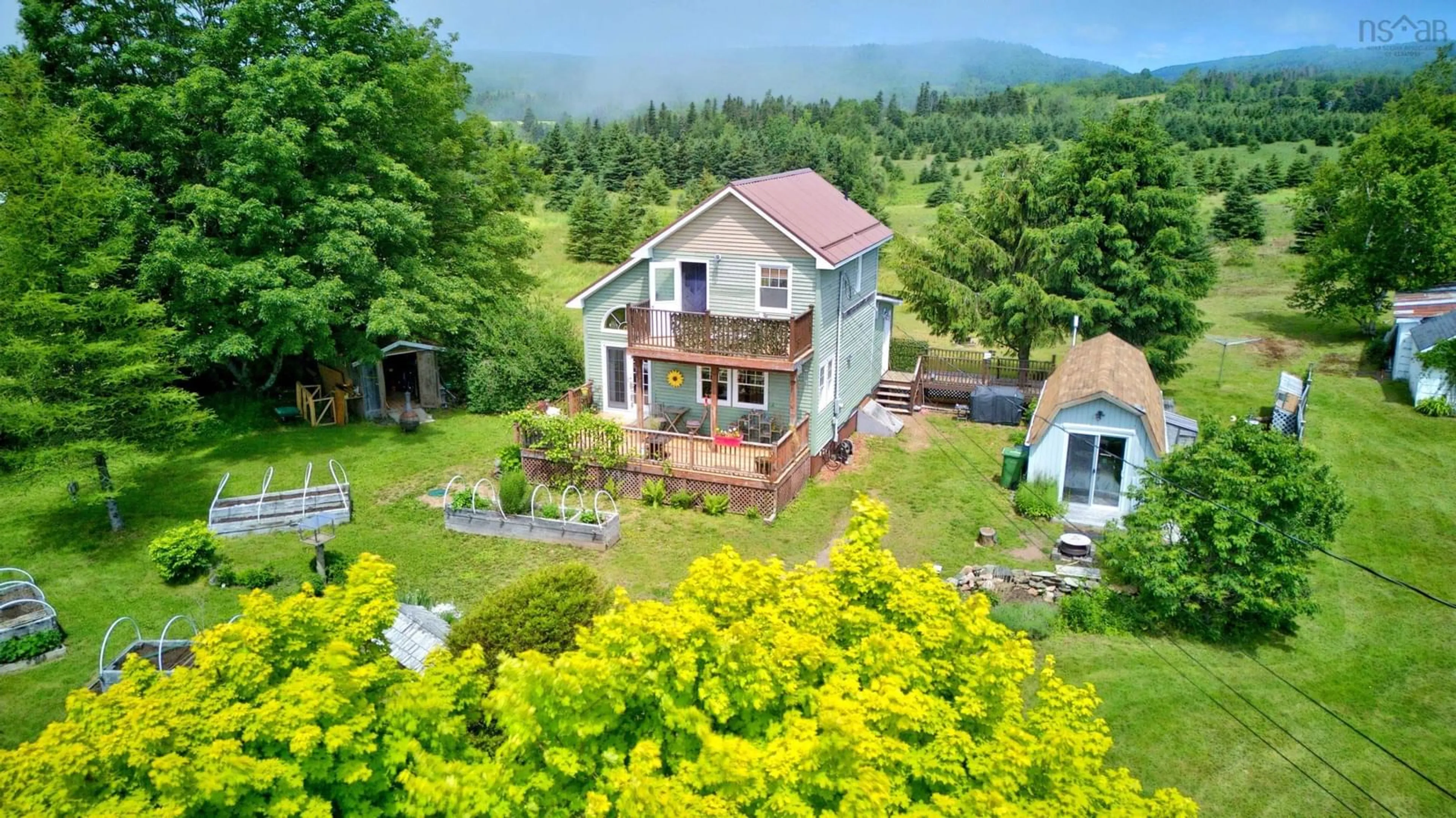 A pic from outside/outdoor area/front of a property/back of a property/a pic from drone, mountain view for 1123 Highway 2, Five Islands Nova Scotia B0M 1K0