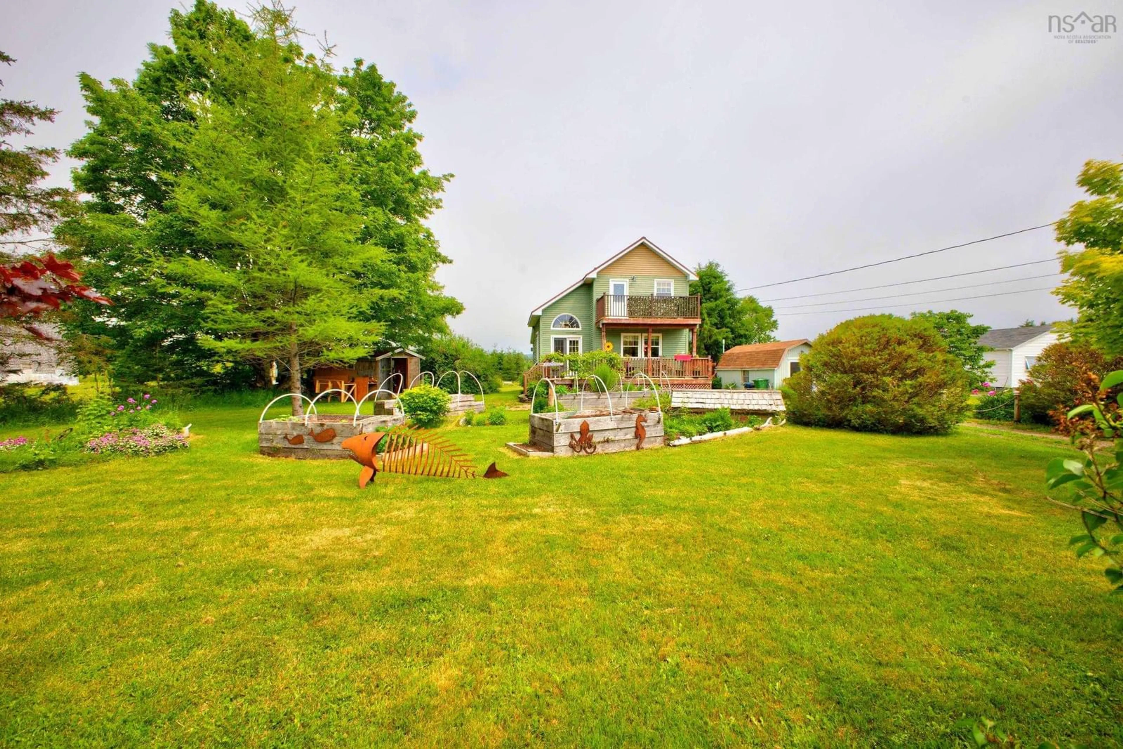 A pic from outside/outdoor area/front of a property/back of a property/a pic from drone, water/lake/river/ocean view for 1123 Highway 2, Five Islands Nova Scotia B0M 1K0