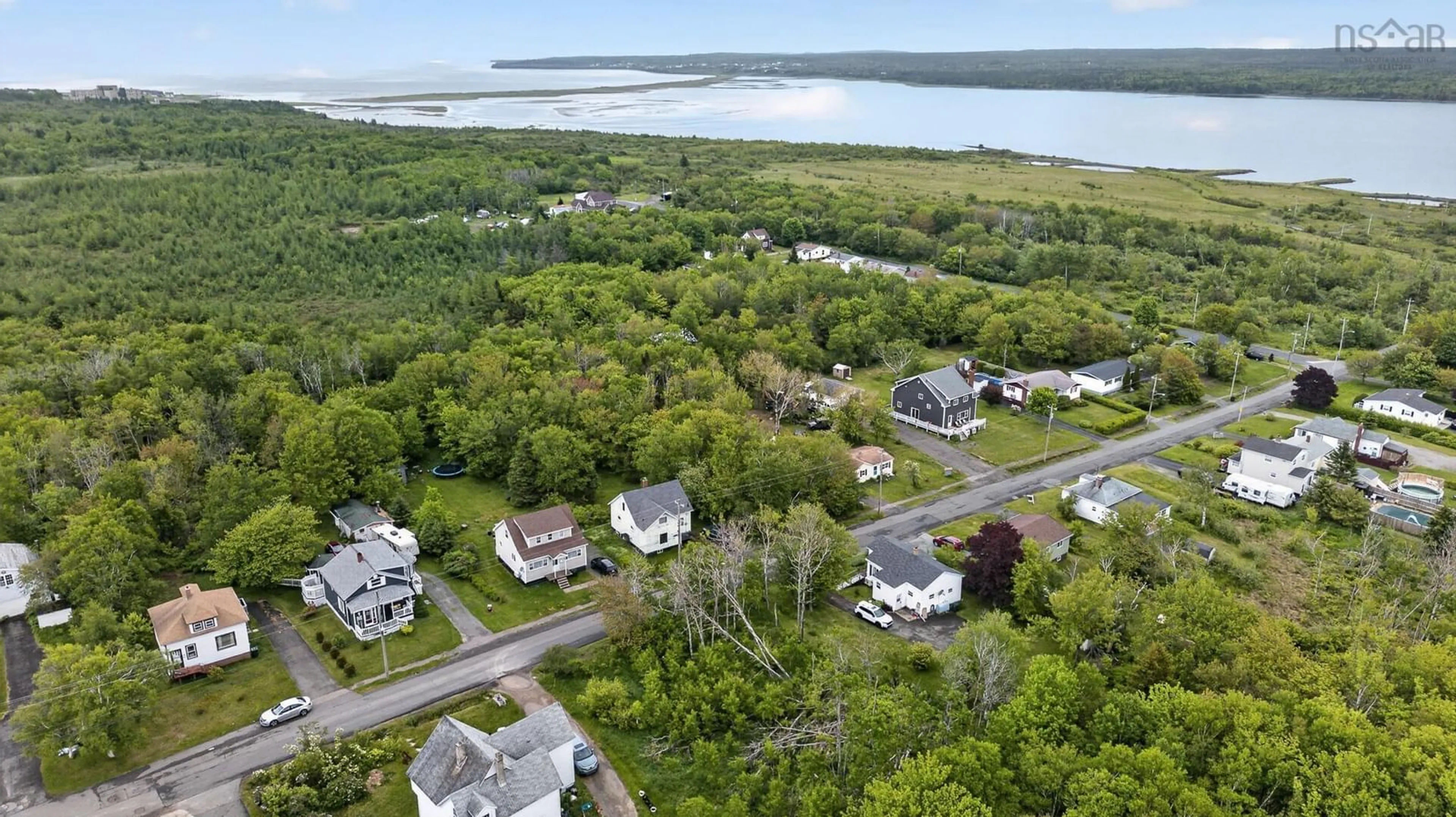 A pic from outside/outdoor area/front of a property/back of a property/a pic from drone, water/lake/river/ocean view for 300 Lake Rd, Glace Bay Nova Scotia B1A 2H1