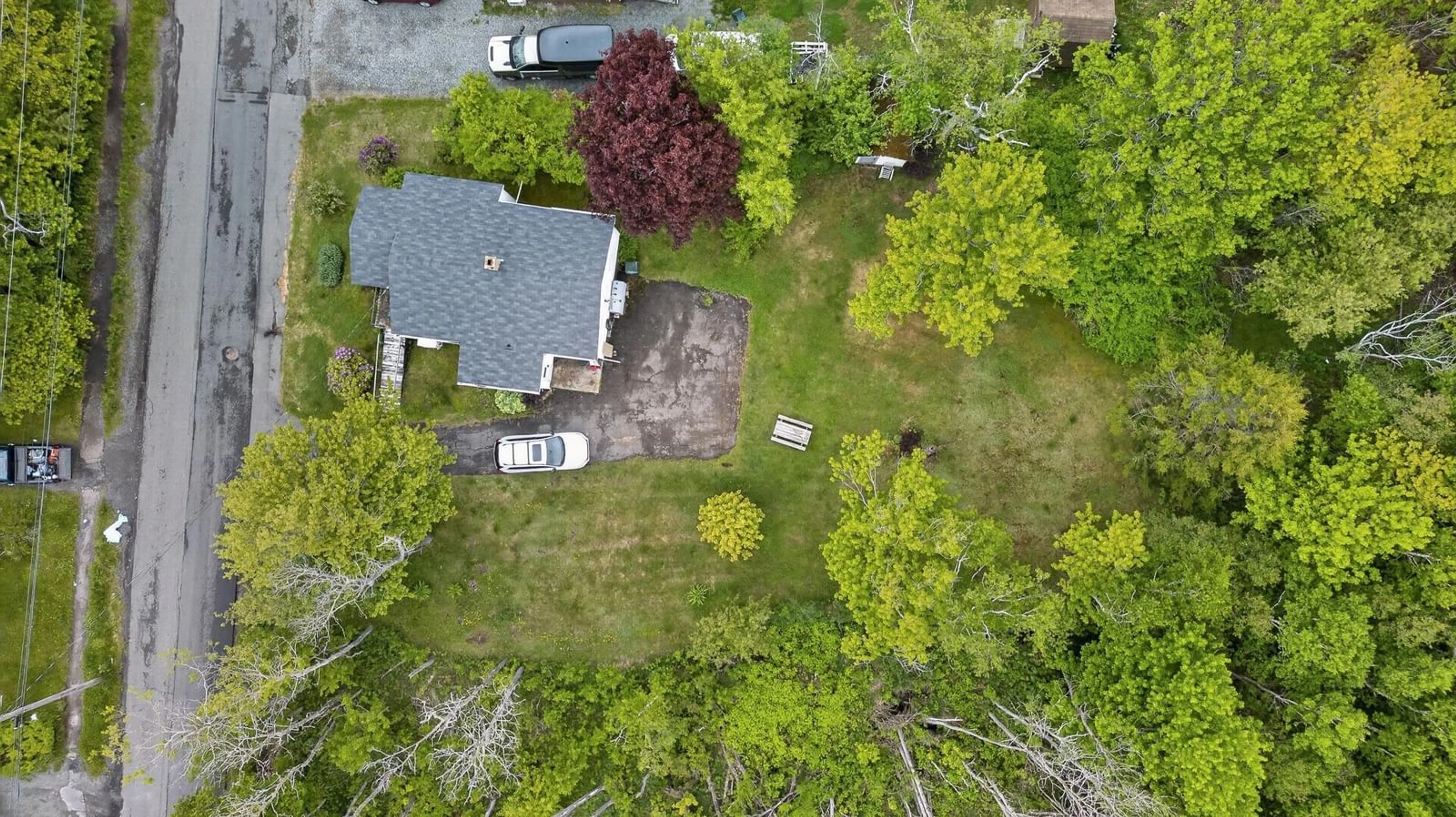A pic from outside/outdoor area/front of a property/back of a property/a pic from drone, street for 300 Lake Rd, Glace Bay Nova Scotia B1A 2H1
