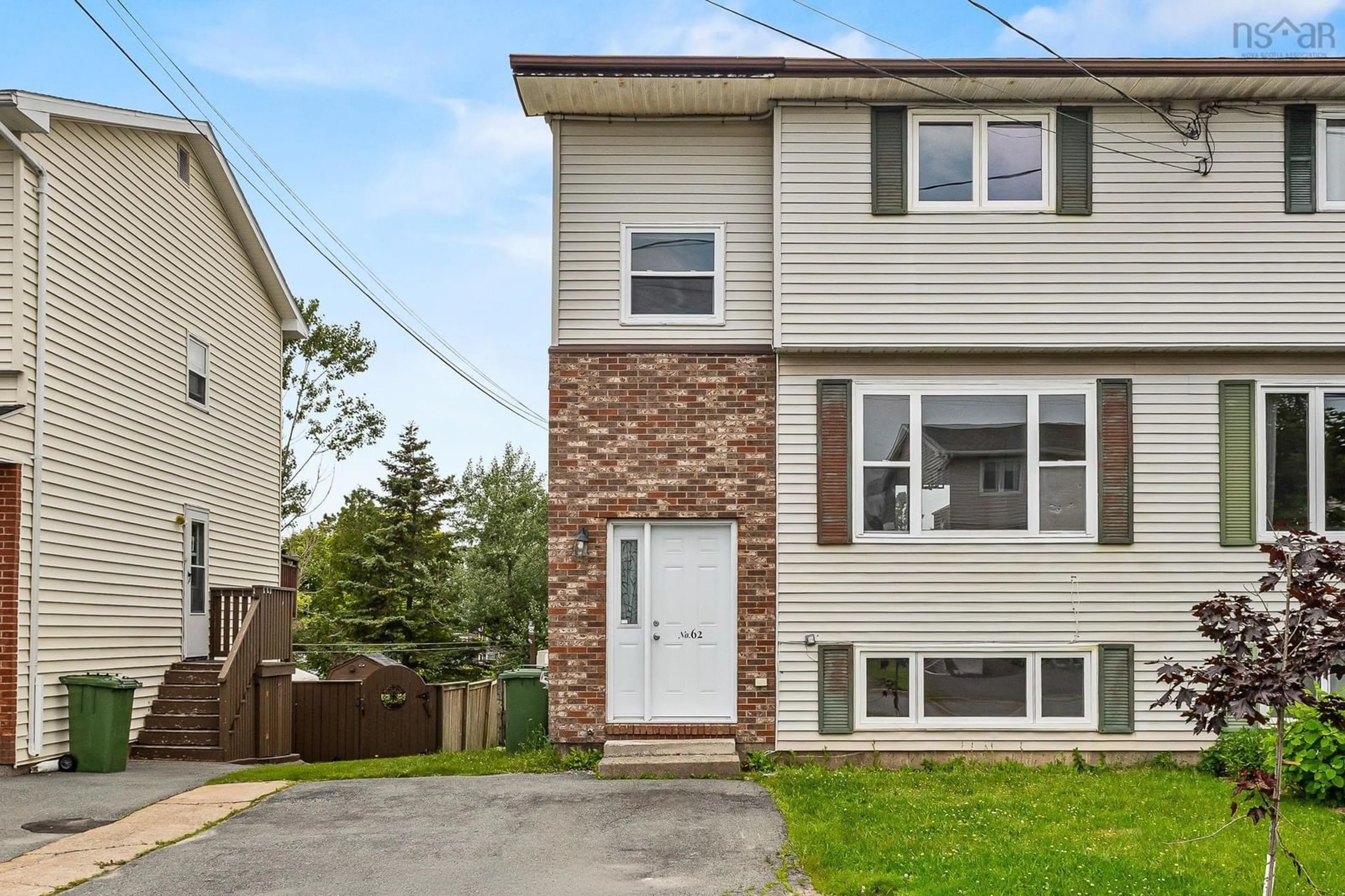 Home with vinyl exterior material, street for 62 Rosewood Lane, Eastern Passage Nova Scotia B3G 1B3