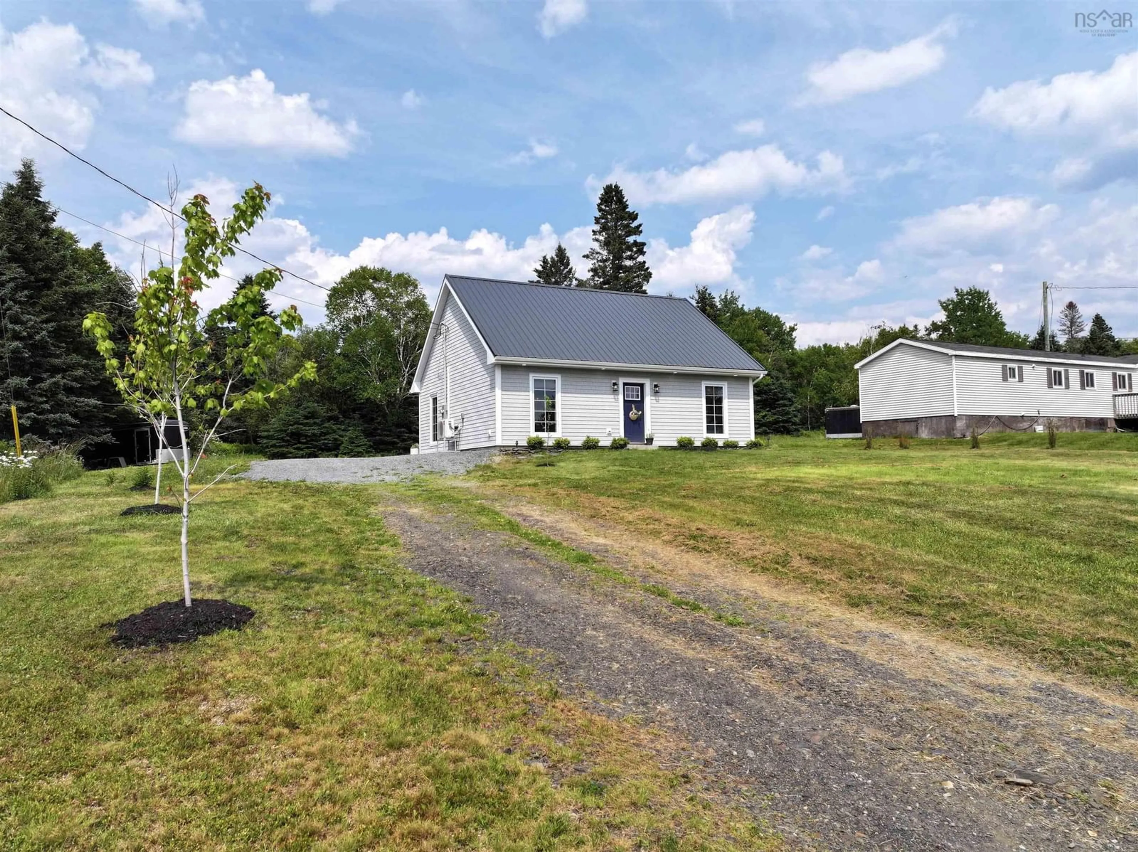 A pic from outside/outdoor area/front of a property/back of a property/a pic from drone, street for 823 Blue Rocks Rd, Garden Lots Nova Scotia B0J 2C0