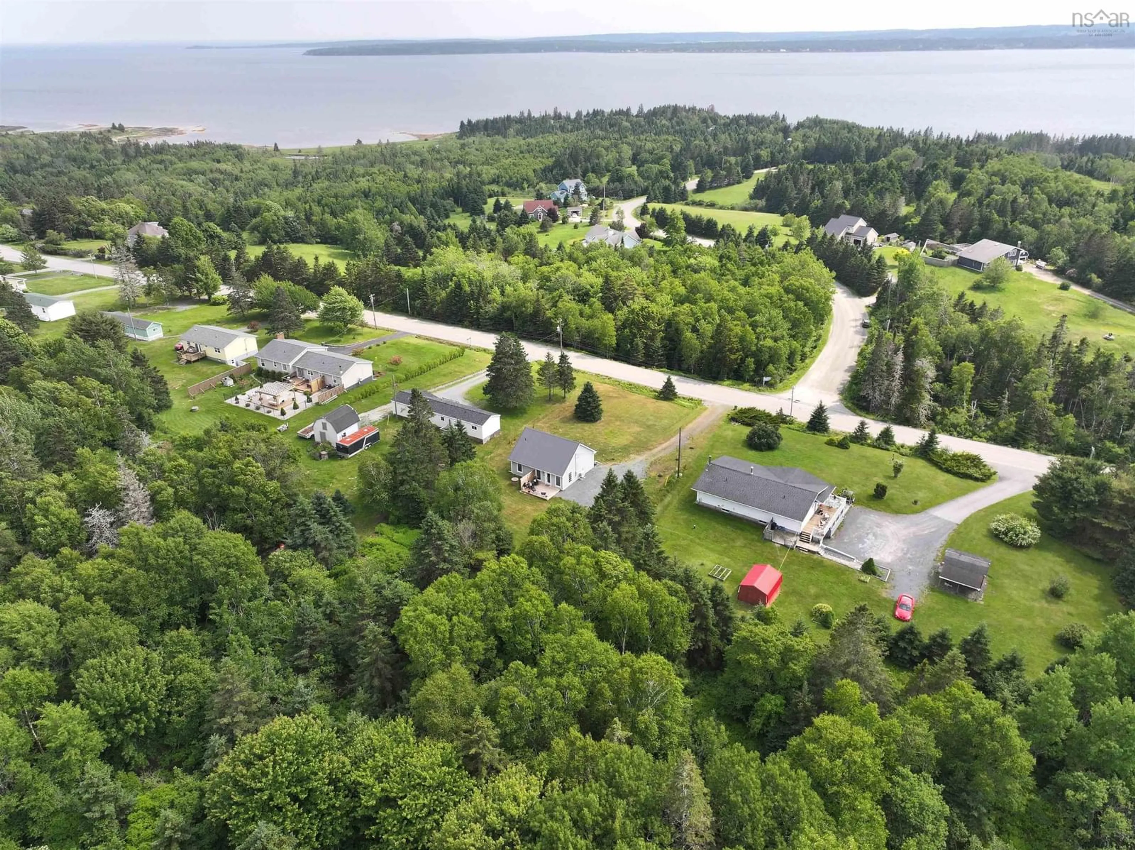 A pic from outside/outdoor area/front of a property/back of a property/a pic from drone, water/lake/river/ocean view for 823 Blue Rocks Rd, Garden Lots Nova Scotia B0J 2C0