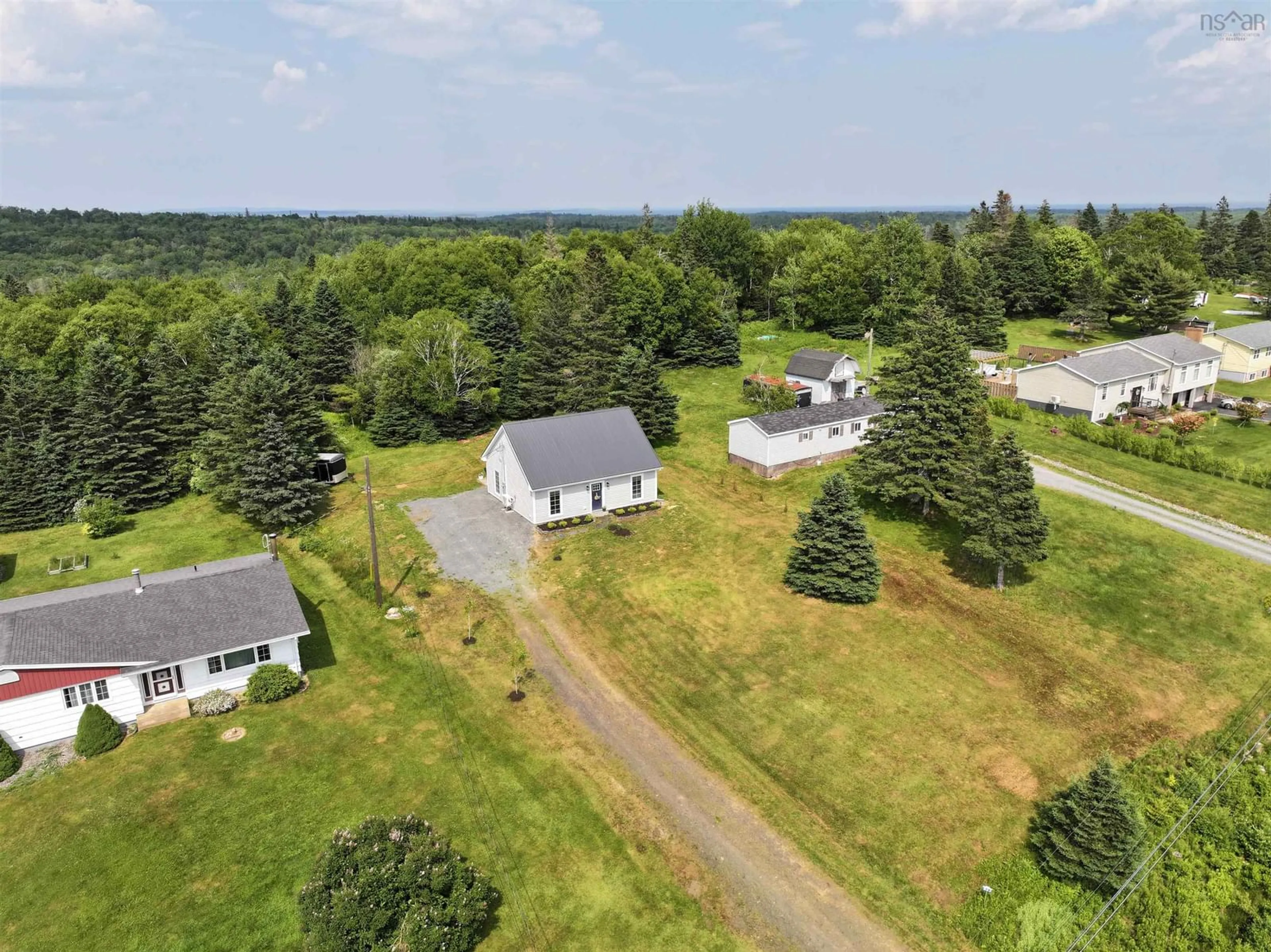 A pic from outside/outdoor area/front of a property/back of a property/a pic from drone, unknown for 823 Blue Rocks Rd, Garden Lots Nova Scotia B0J 2C0