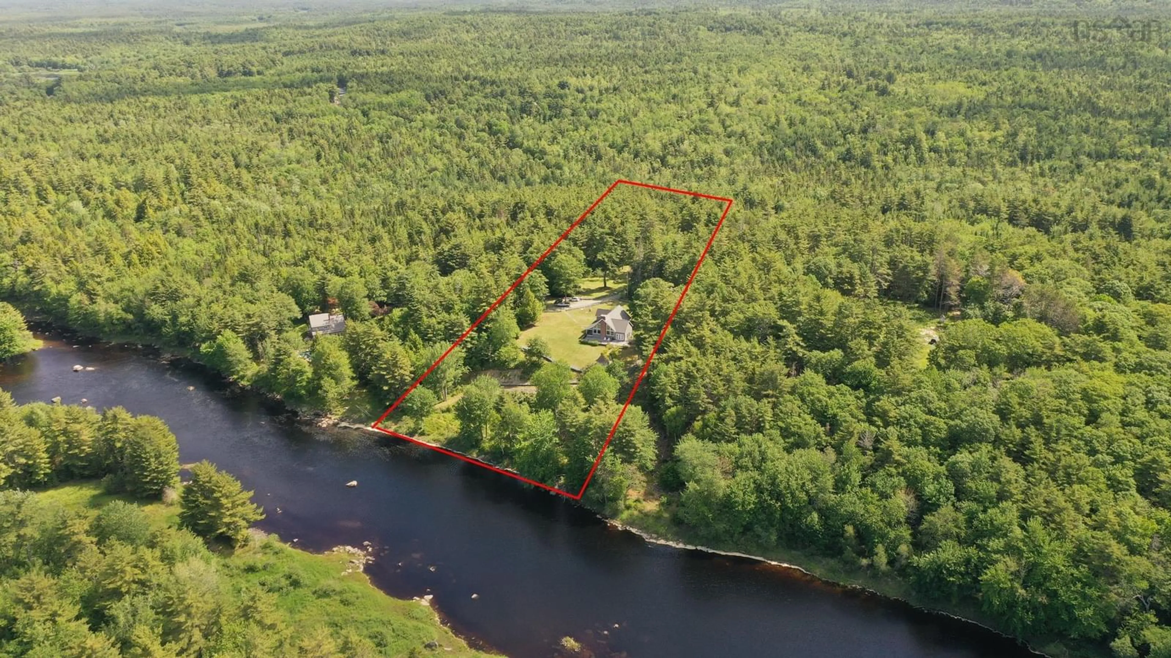 A pic from outside/outdoor area/front of a property/back of a property/a pic from drone, water/lake/river/ocean view for 217 Mill Village East Rd, Mill Village Nova Scotia B0J 2H0
