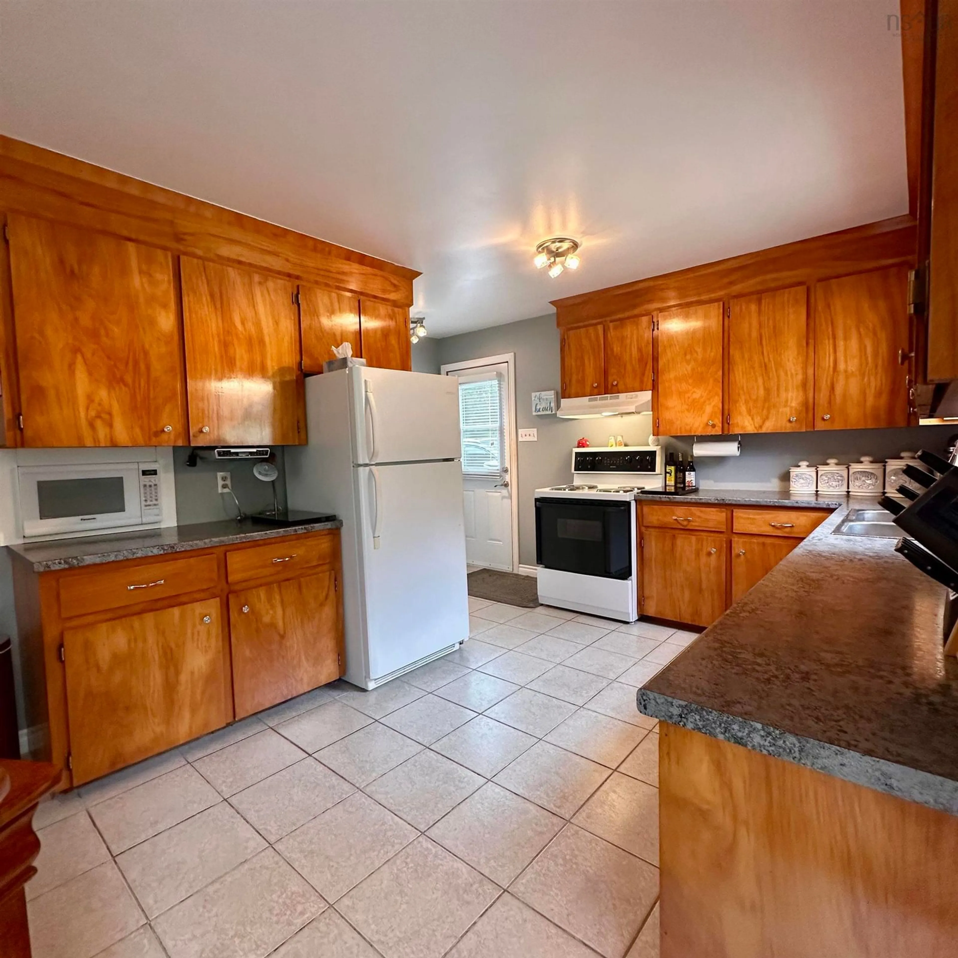 Standard kitchen, ceramic/tile floor for 126 Wilkies Cove Rd, Middle Lahave Nova Scotia B4V 2Y4