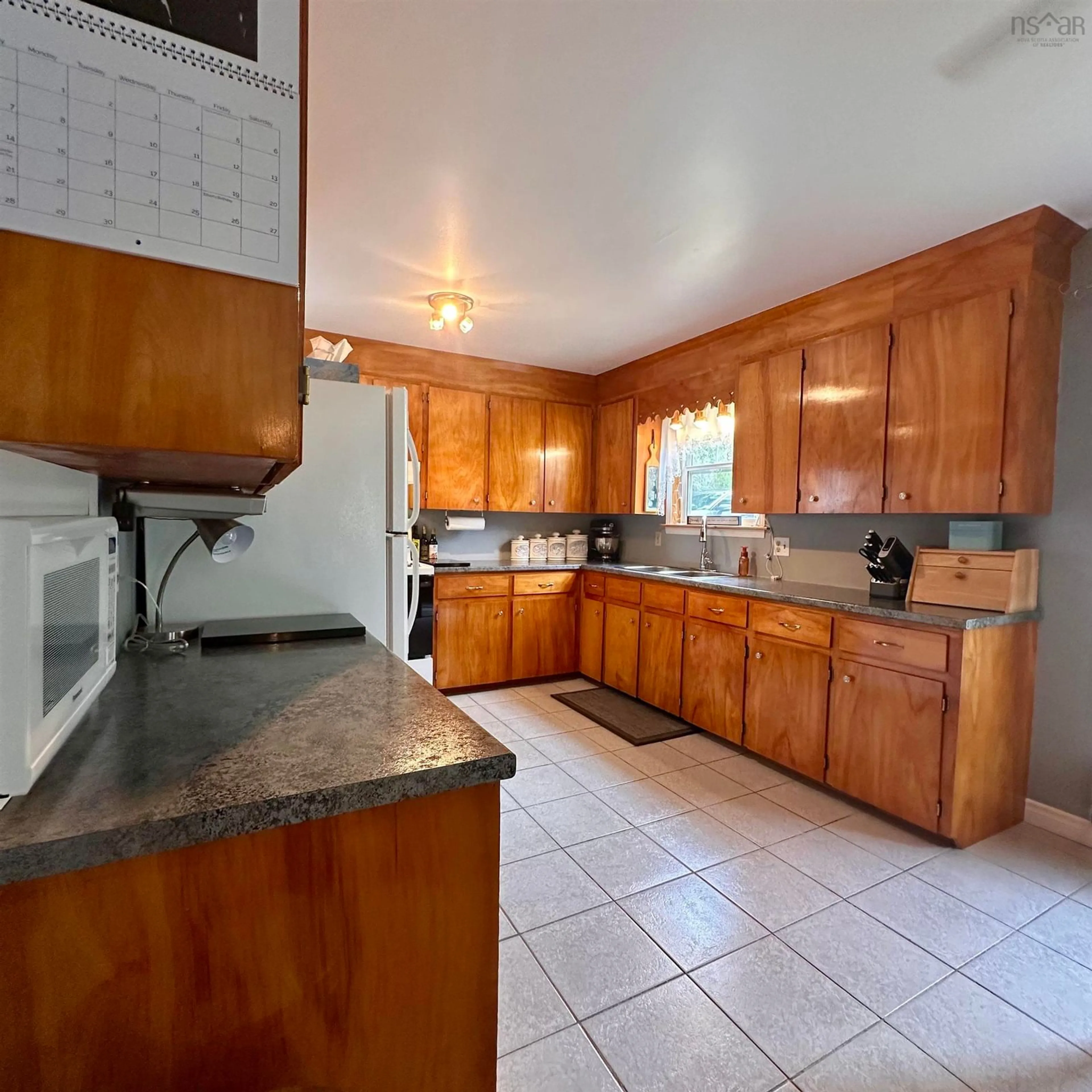 Standard kitchen, ceramic/tile floor for 126 Wilkies Cove Rd, Middle Lahave Nova Scotia B4V 2Y4