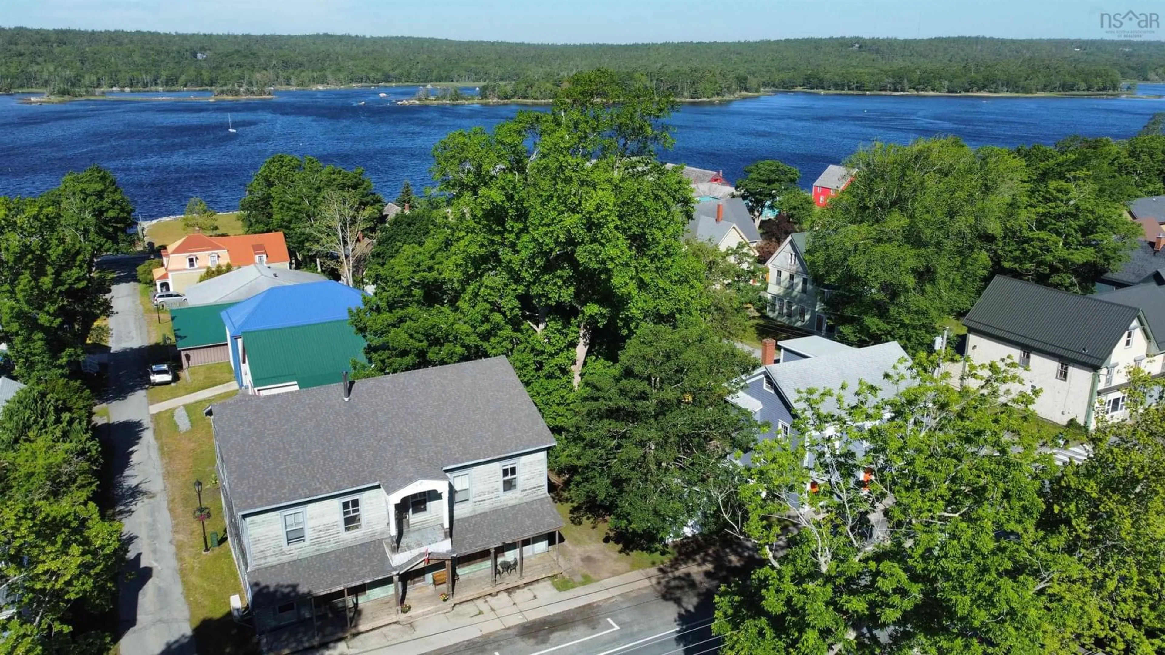 A pic from outside/outdoor area/front of a property/back of a property/a pic from drone, water/lake/river/ocean view for 121 Water St, Shelburne Nova Scotia B0T 1W0