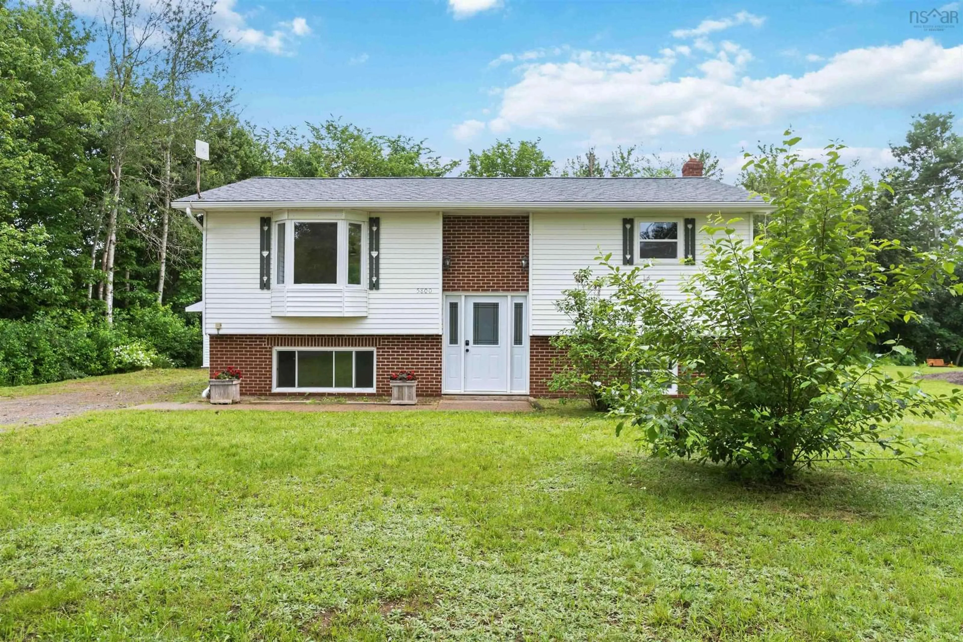 Home with vinyl exterior material, street for Highway 221 #5800, Woodville Nova Scotia B0P 1G0