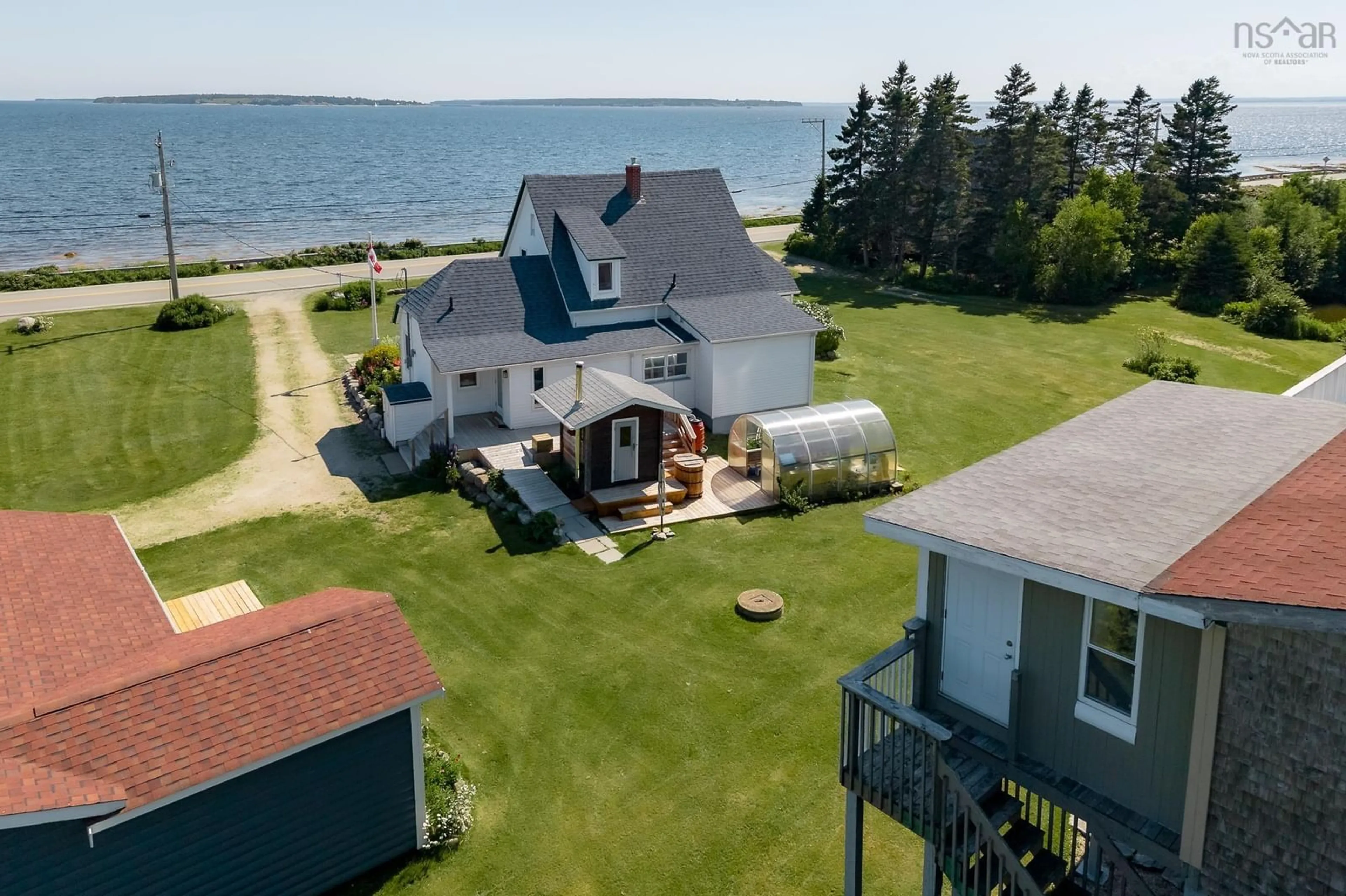 A pic from outside/outdoor area/front of a property/back of a property/a pic from drone, water/lake/river/ocean view for 5264 & 5266 Highway 329, Blandford Nova Scotia B0J 1T0