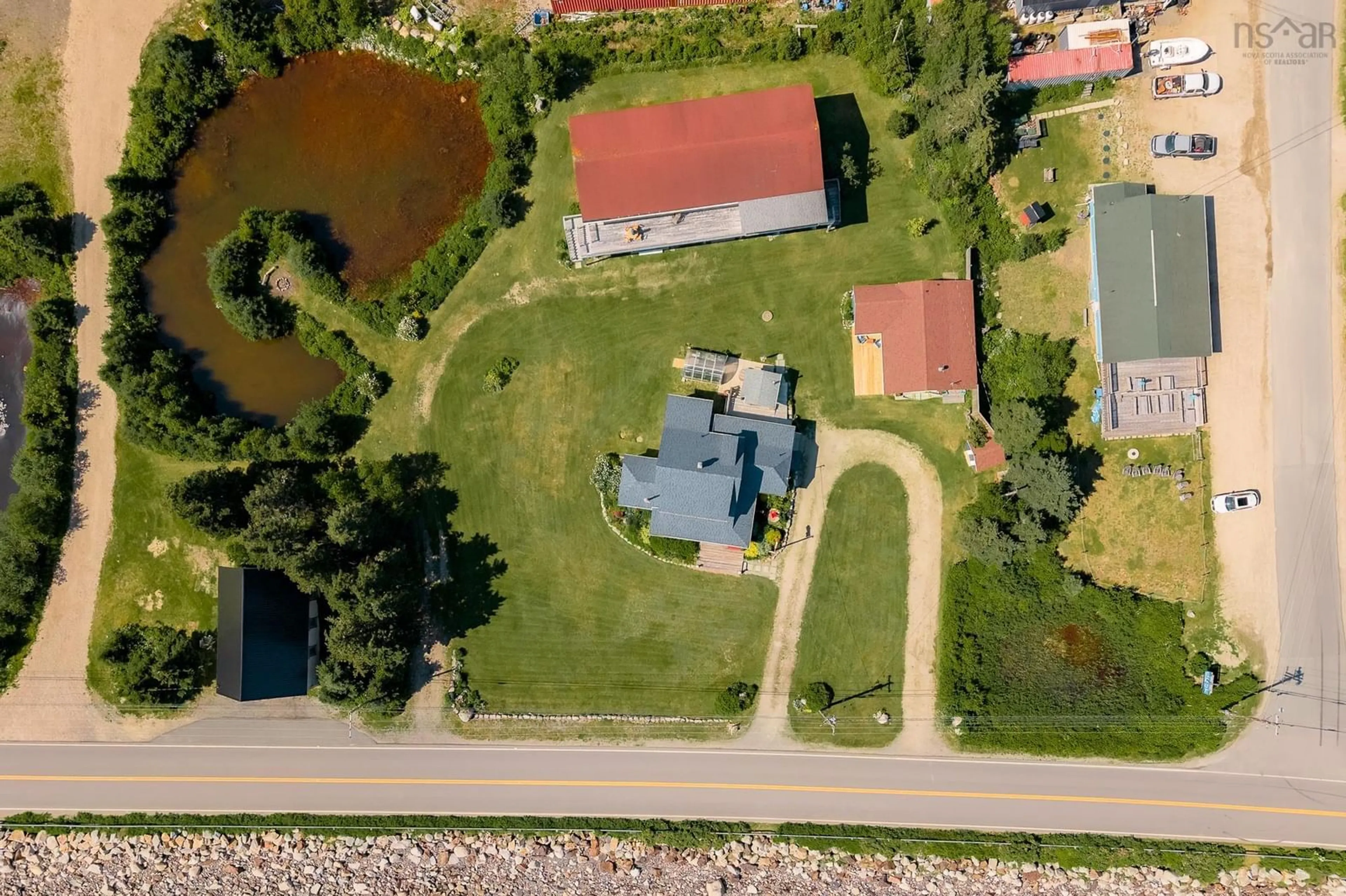 A pic from outside/outdoor area/front of a property/back of a property/a pic from drone, water/lake/river/ocean view for 5264 & 5266 Highway 329, Blandford Nova Scotia B0J 1T0