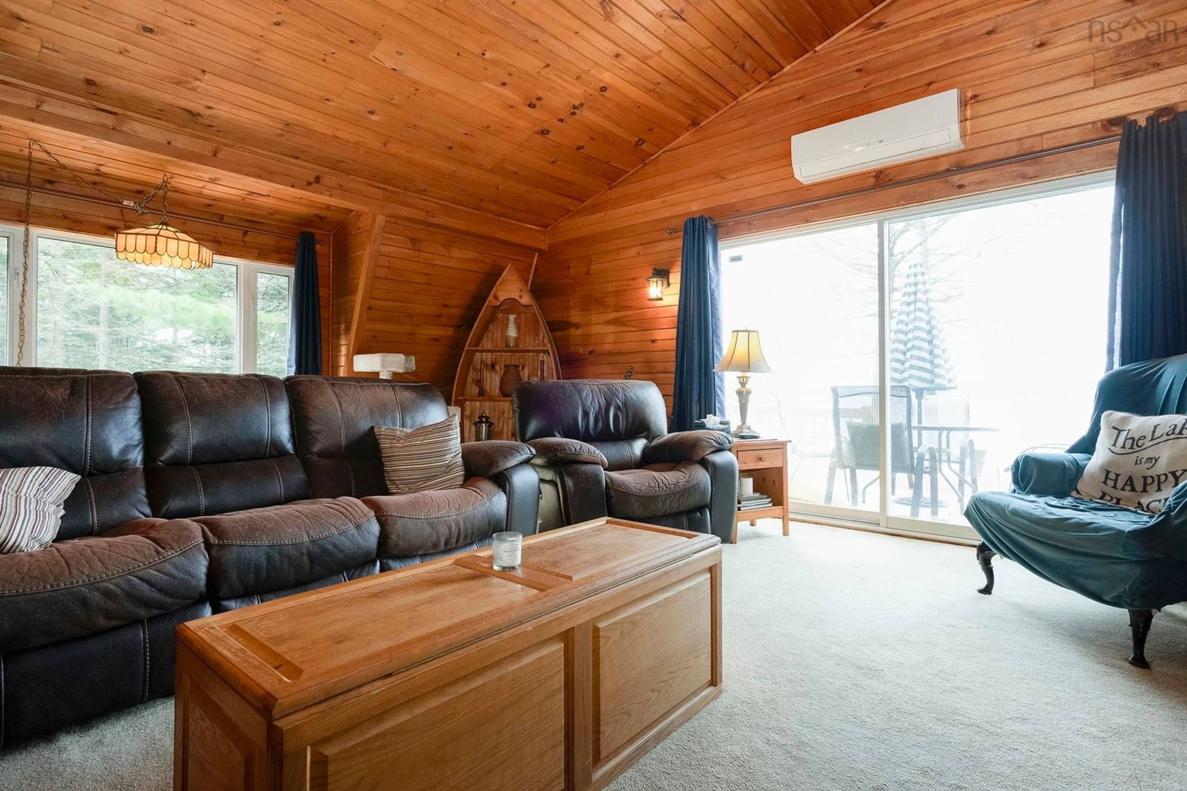 Living room with furniture, wood/laminate floor for 12439 Peskawa Close St, Kempt Nova Scotia B0T 1B0