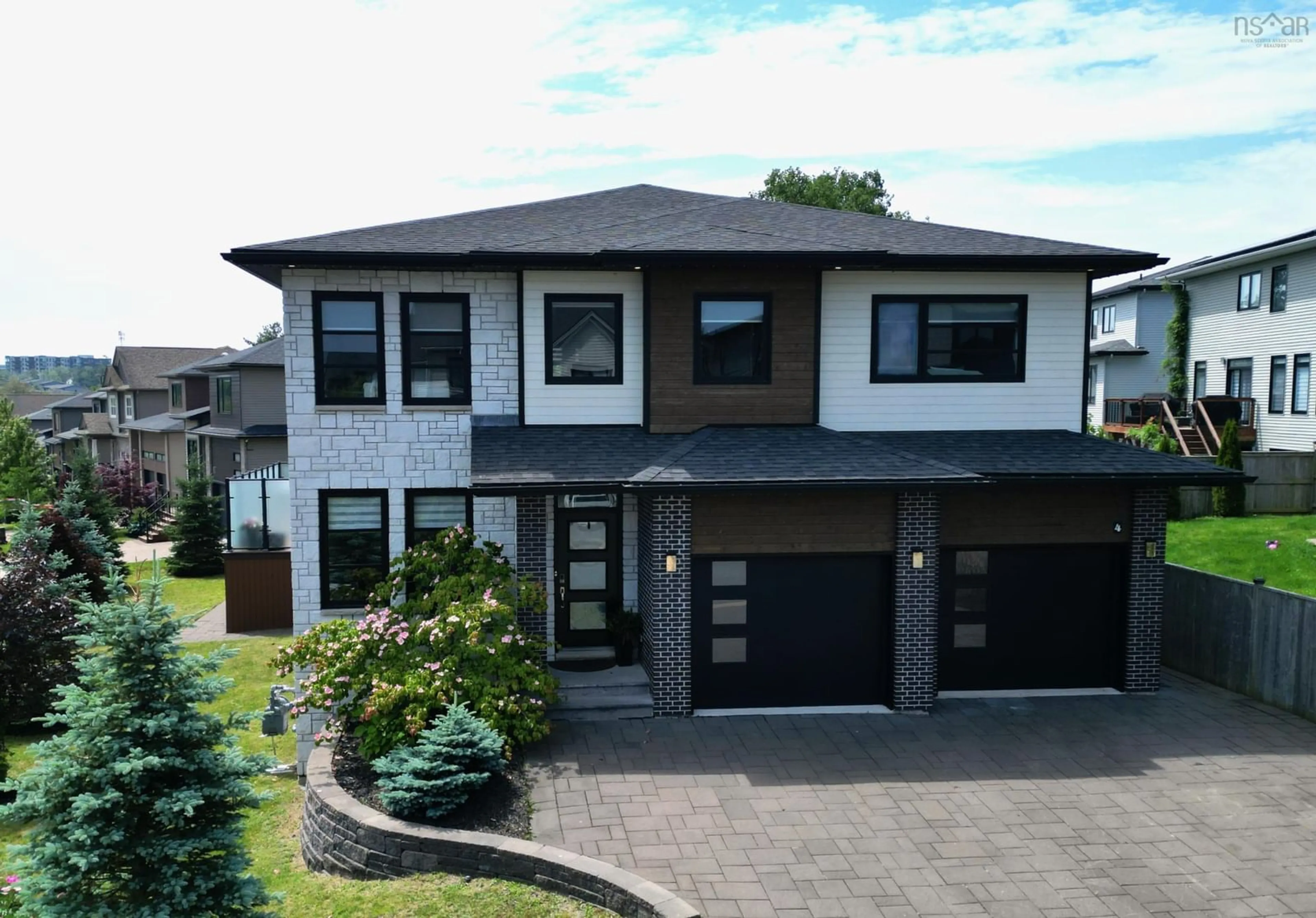 Home with brick exterior material, street for 4 Crownridge Dr, Bedford Nova Scotia B4B 0X4