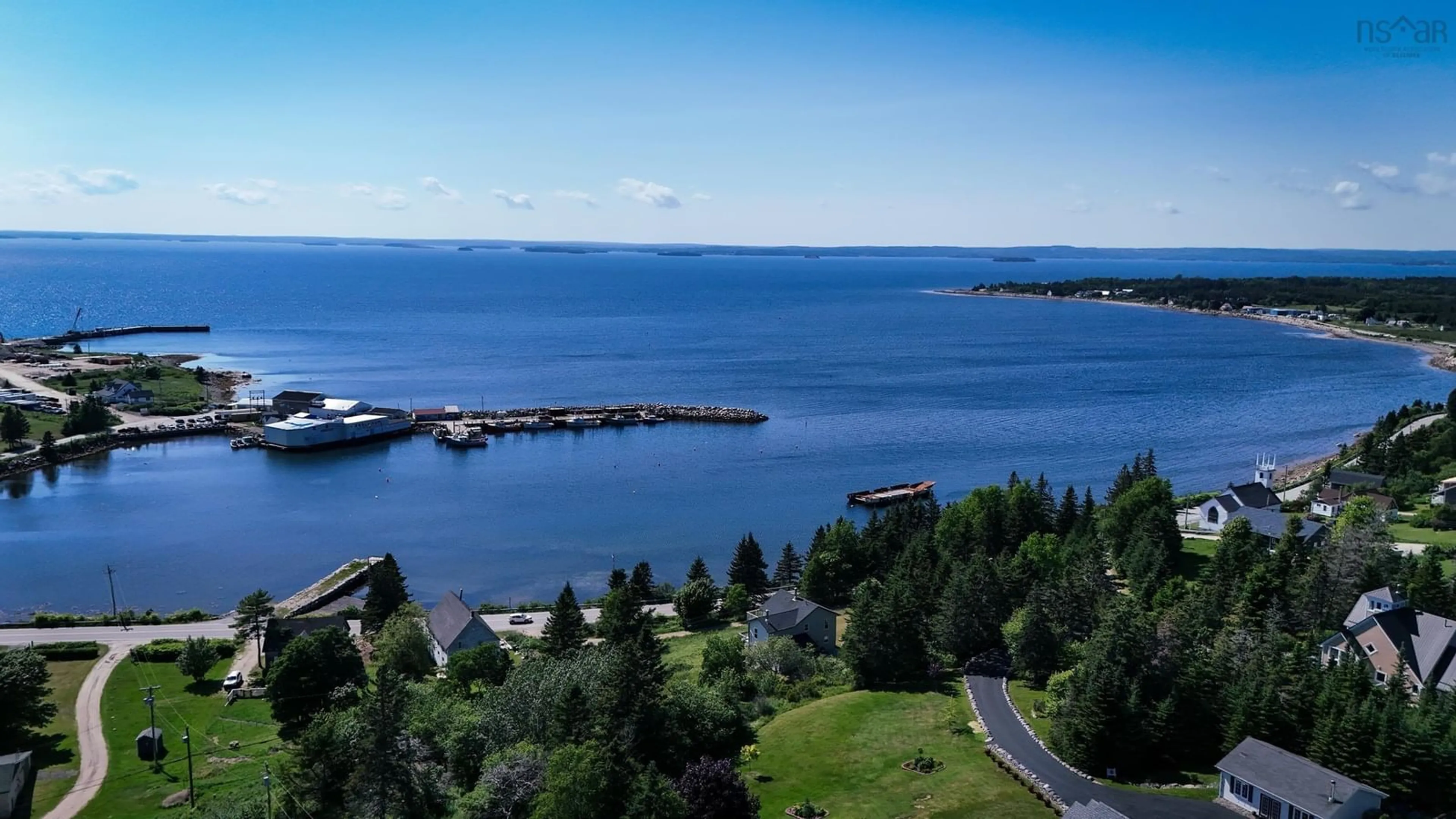 A pic from outside/outdoor area/front of a property/back of a property/a pic from drone, water/lake/river/ocean view for 4932 Highway 329, Blandford Nova Scotia B0J 1T0