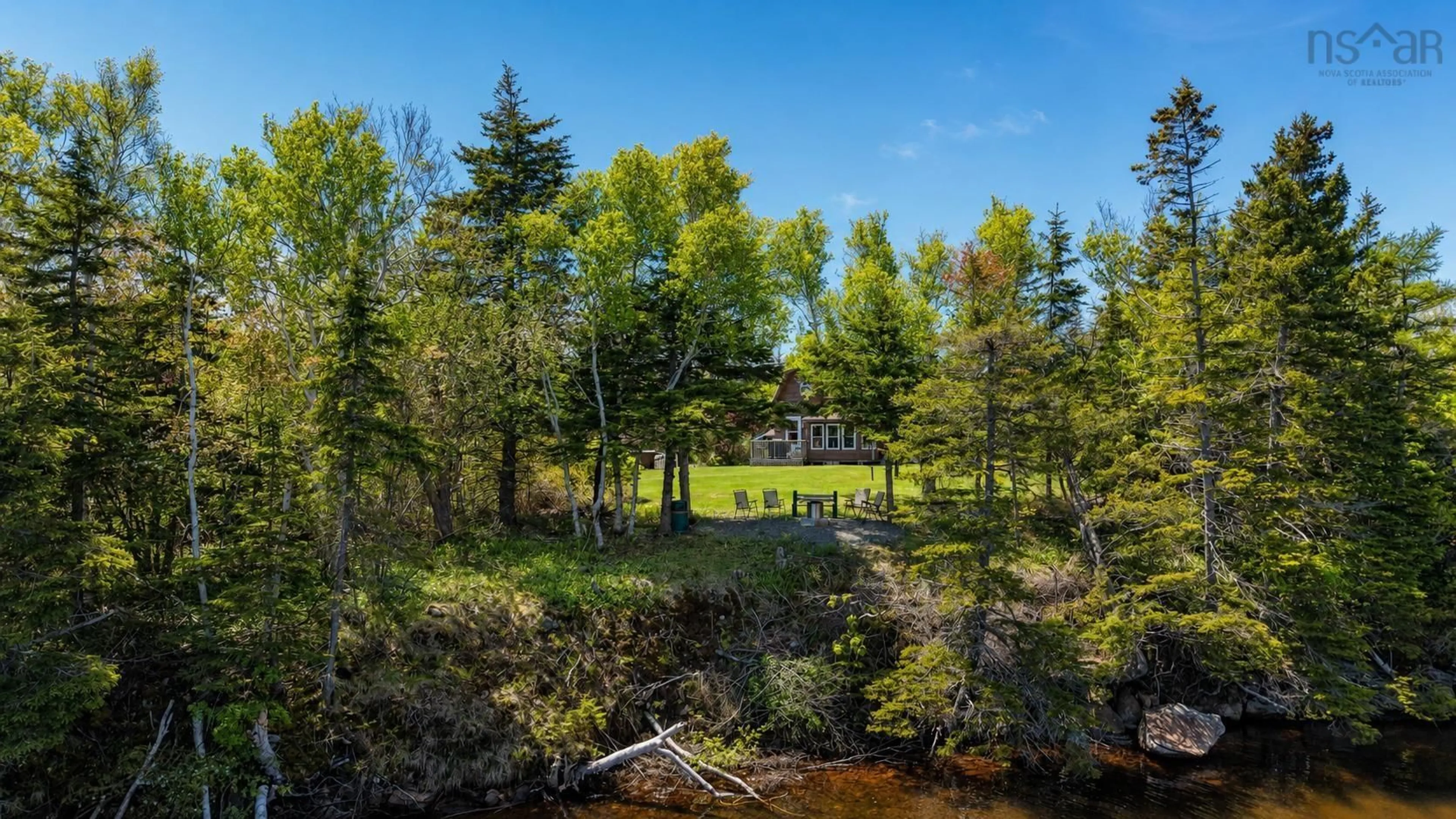 A pic from outside/outdoor area/front of a property/back of a property/a pic from drone, water/lake/river/ocean view for 3539 Highway 255, Black Brook Nova Scotia B1B 1T7