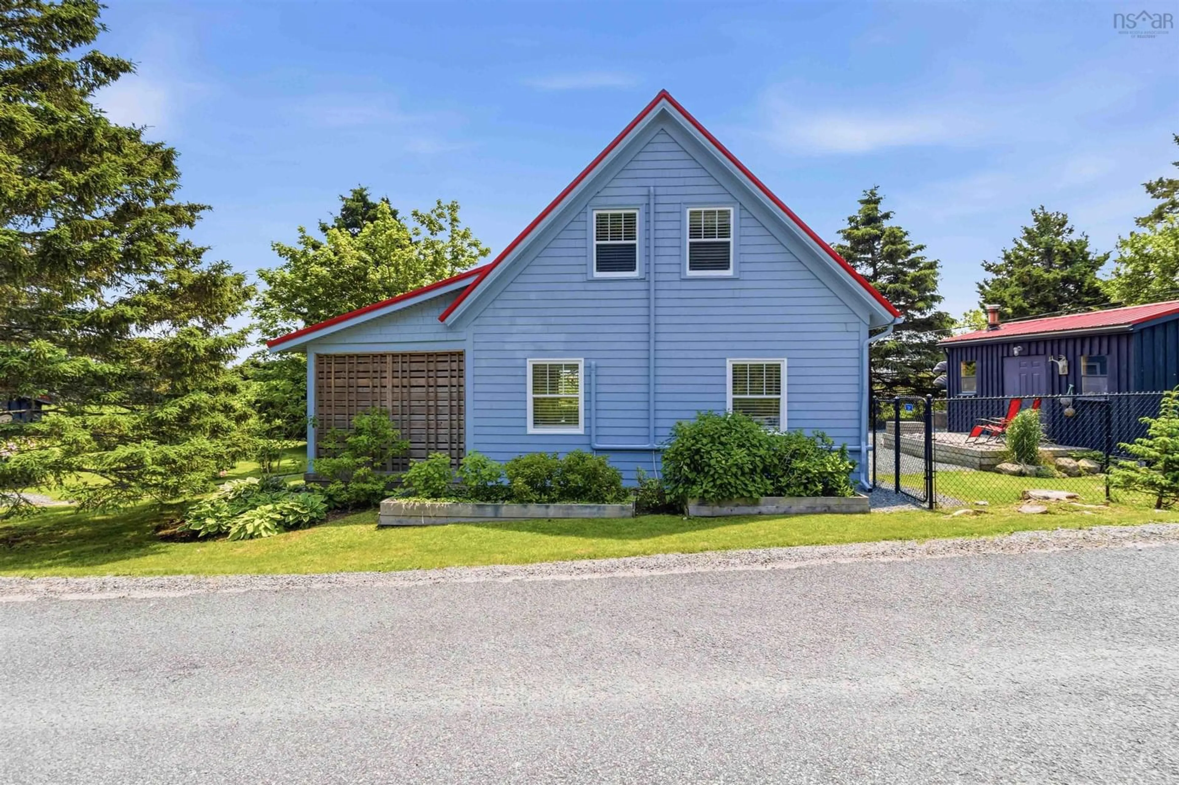 A pic from outside/outdoor area/front of a property/back of a property/a pic from drone, street for 5 Sand Beach Rd, Western Head Nova Scotia B0T 1K0