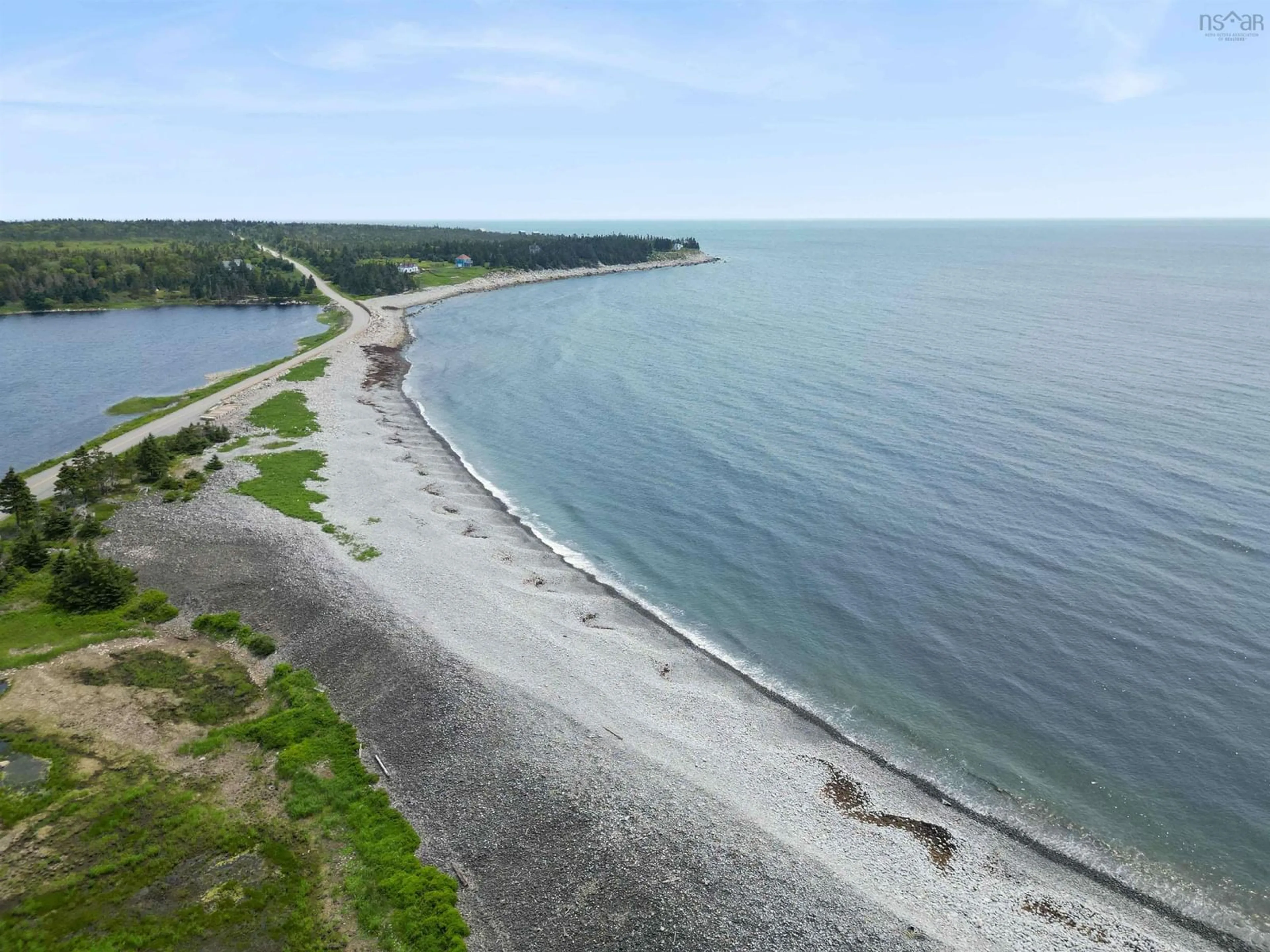 A pic from outside/outdoor area/front of a property/back of a property/a pic from drone, water/lake/river/ocean view for 5 Sand Beach Rd, Western Head Nova Scotia B0T 1K0
