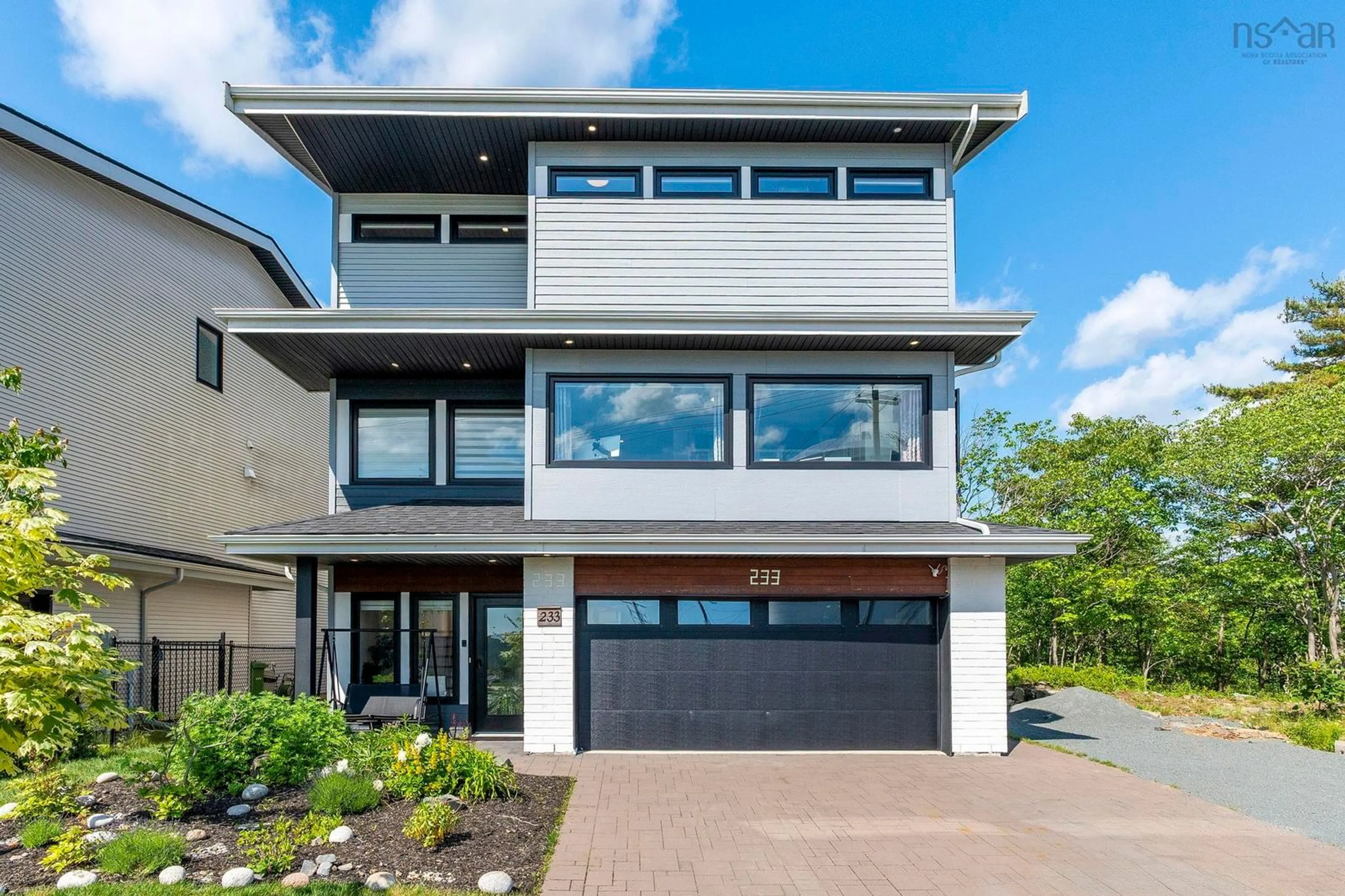 Home with vinyl exterior material, street for 233 Transom Dr, Halifax Nova Scotia B3M 0L7