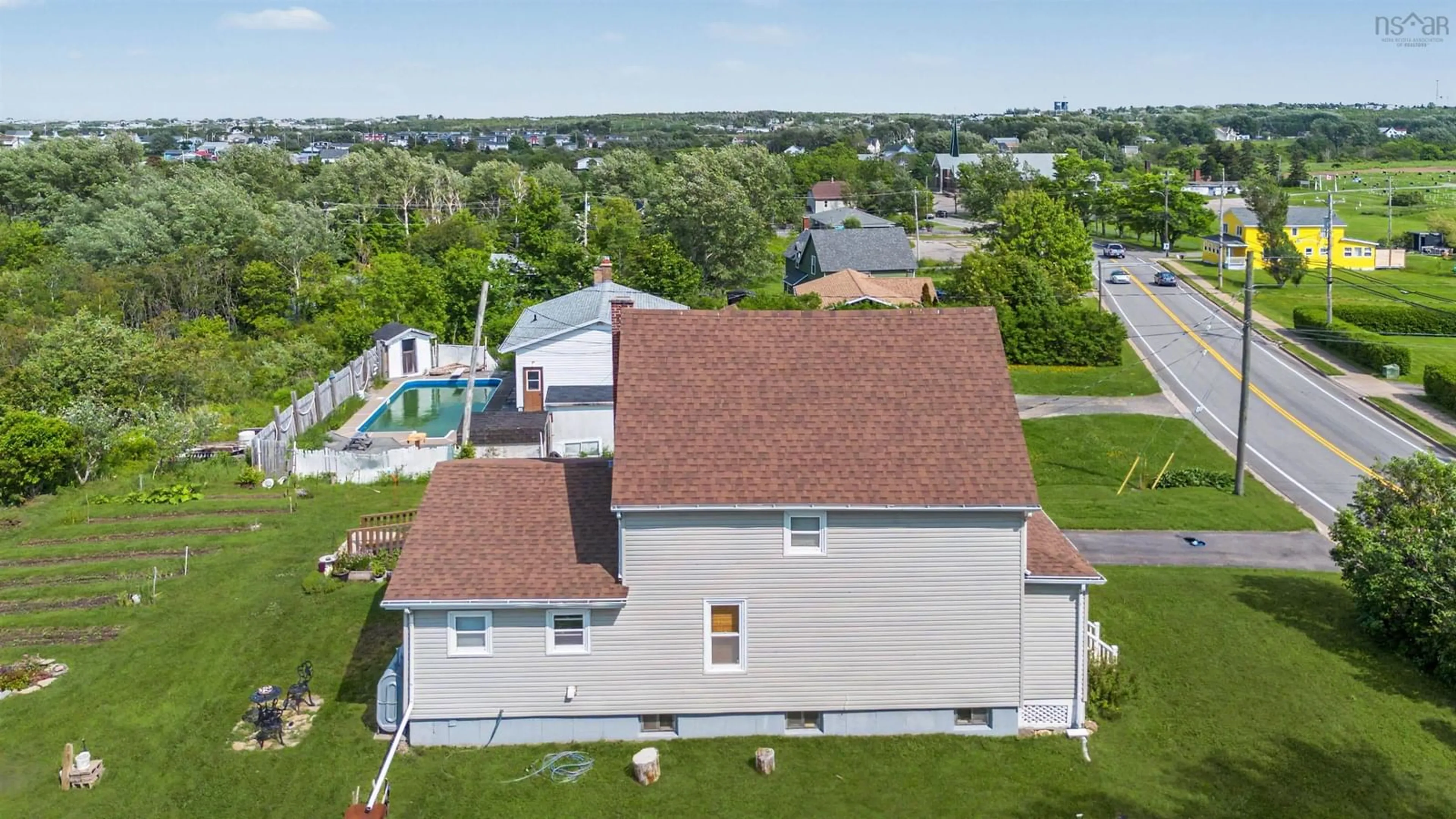 A pic from outside/outdoor area/front of a property/back of a property/a pic from drone, unknown for 383 Kings Rd, Dominion Nova Scotia B1G 1G9