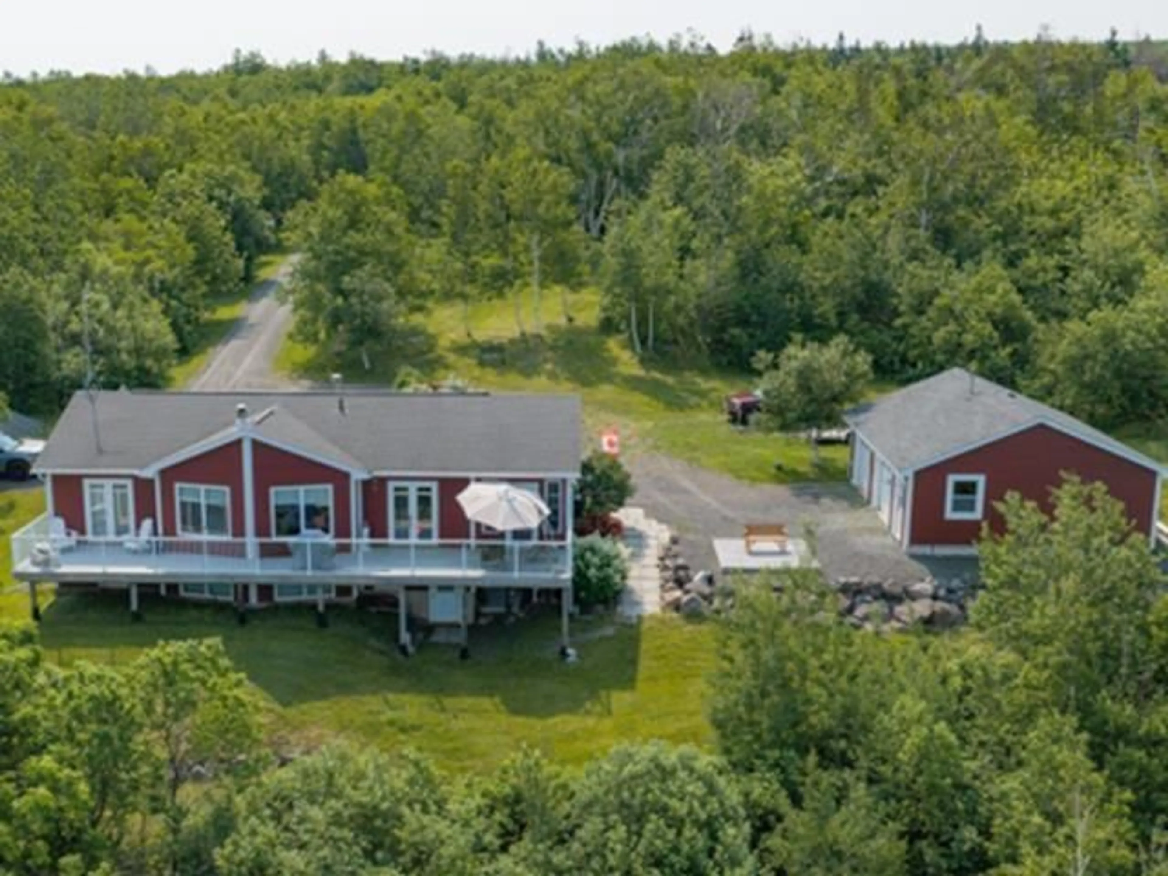 A pic from outside/outdoor area/front of a property/back of a property/a pic from drone, water/lake/river/ocean view for 8646 Highway 337 Georgeville   B2g 2l1, Morar Nova Scotia B2G 2L1