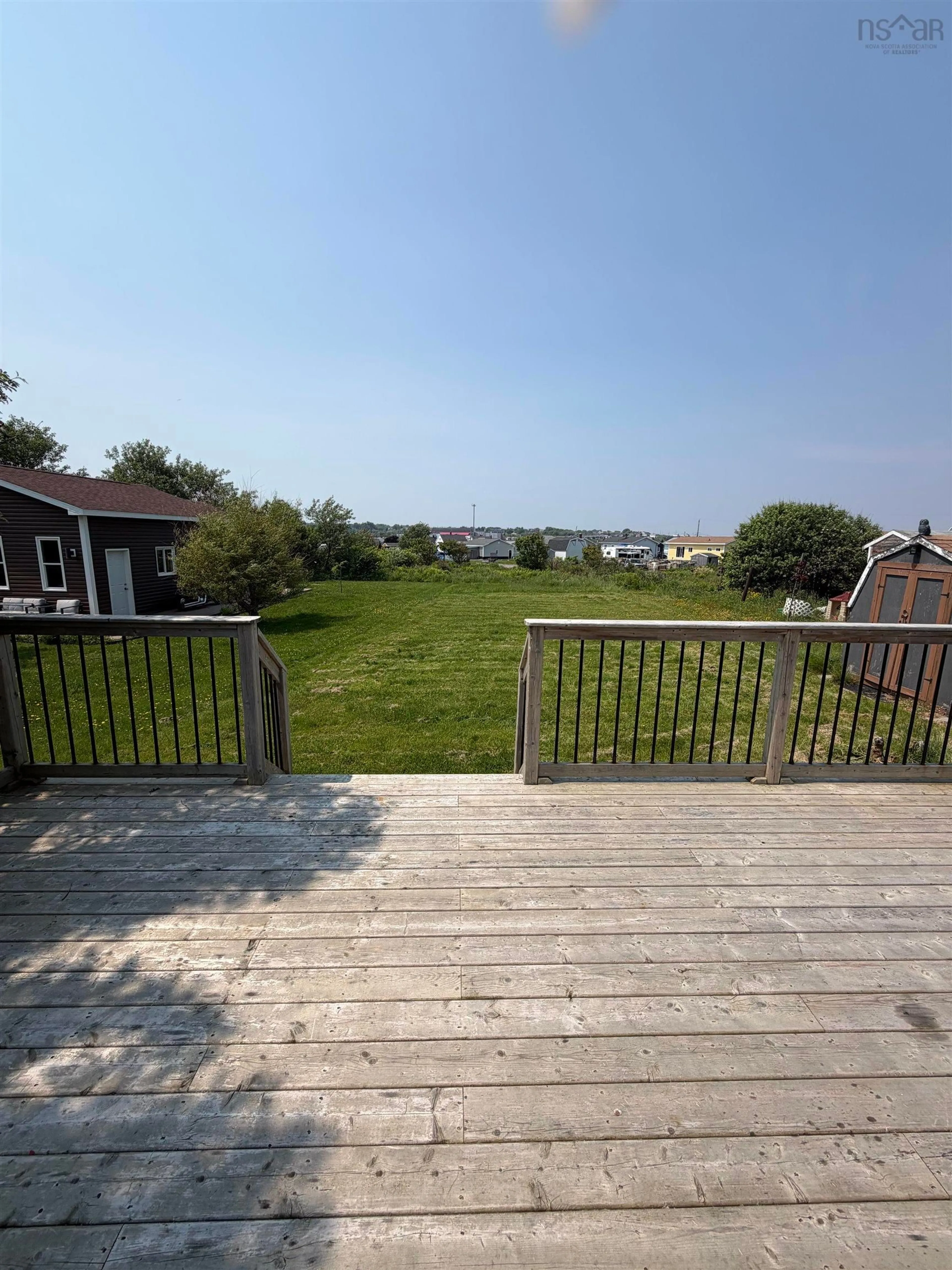 A pic from outside/outdoor area/front of a property/back of a property/a pic from drone, water/lake/river/ocean view for 219 Brookland St, Glace Bay Nova Scotia B1A 1N4