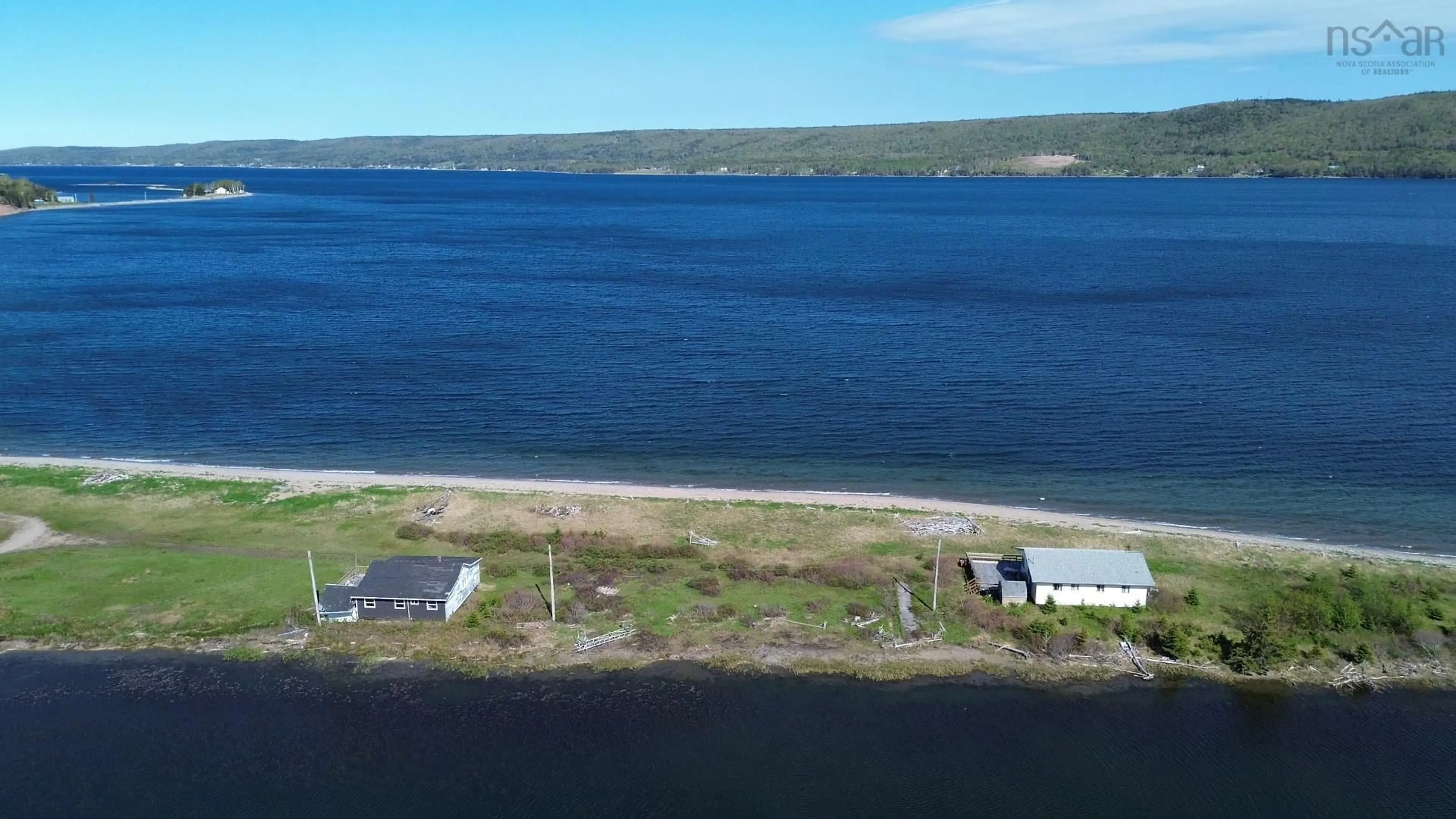 A pic from outside/outdoor area/front of a property/back of a property/a pic from drone, water/lake/river/ocean view for 2667 Eskasoni Rd, Islandview Nova Scotia B1J 1J6