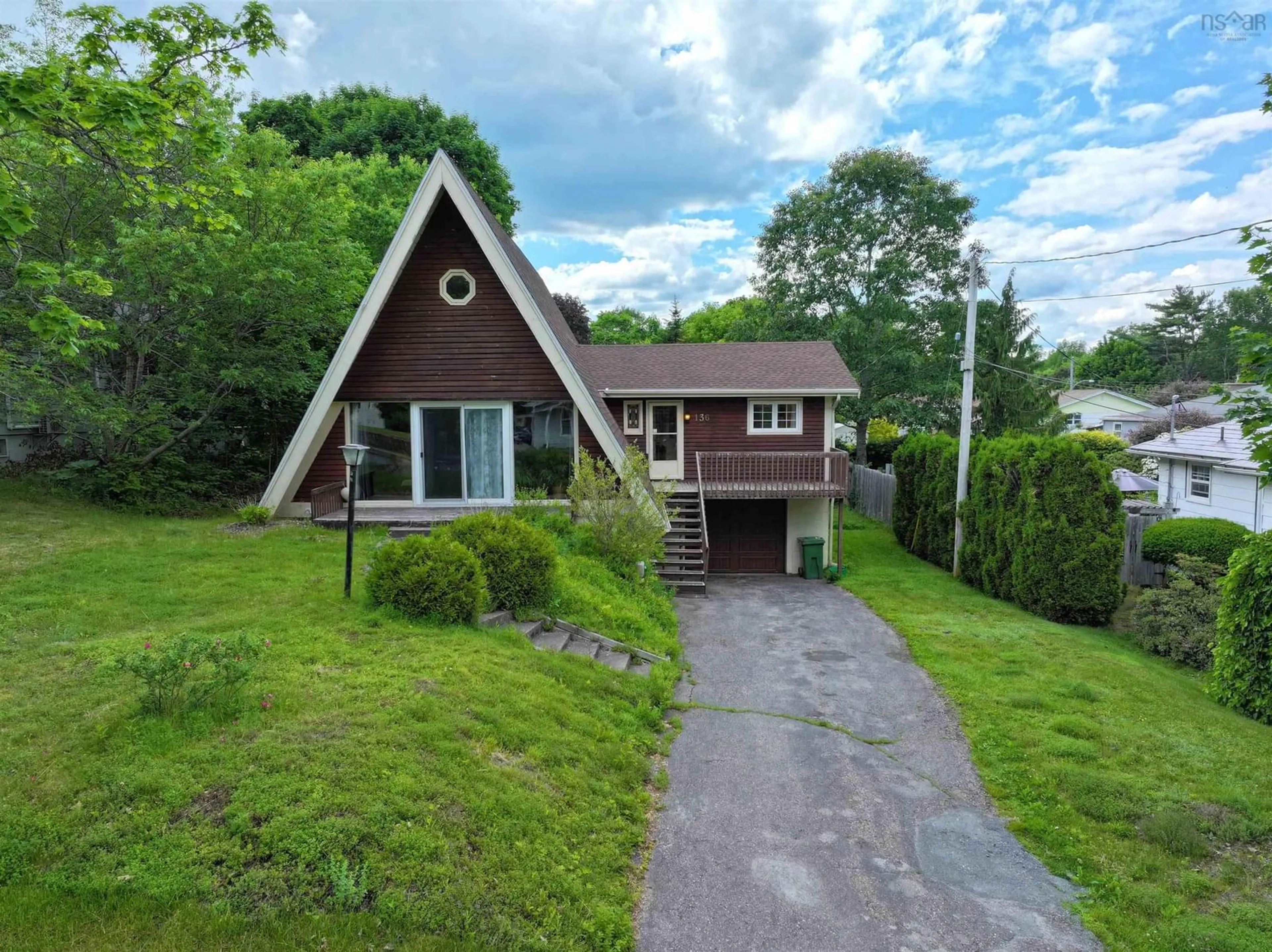 A pic from outside/outdoor area/front of a property/back of a property/a pic from drone, unknown for 136 Empire St, Bridgewater Nova Scotia B4V 2M1