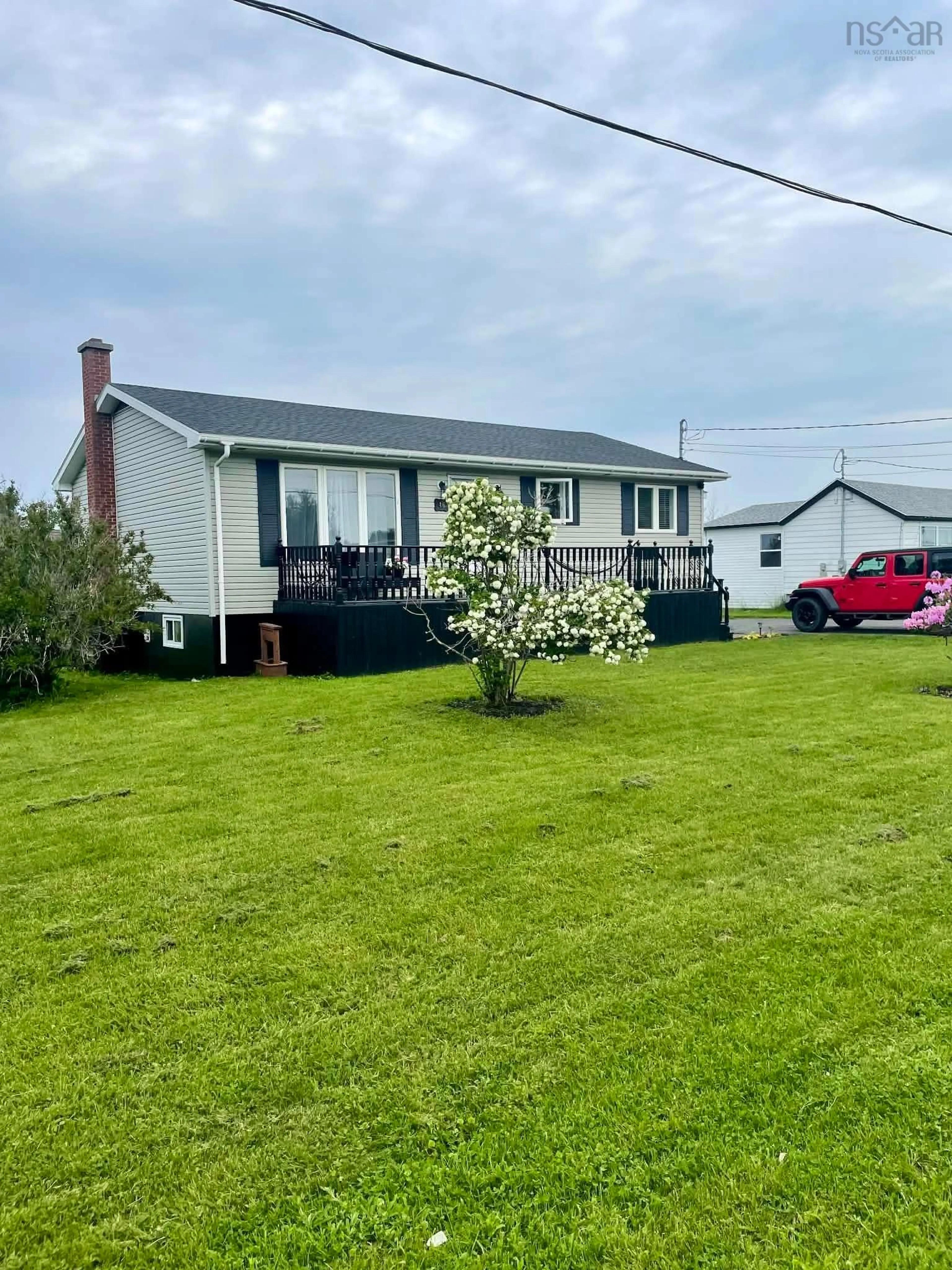 A pic from outside/outdoor area/front of a property/back of a property/a pic from drone, water/lake/river/ocean view for 46 Rateau St, Sydney Mines Nova Scotia B1V 1X2