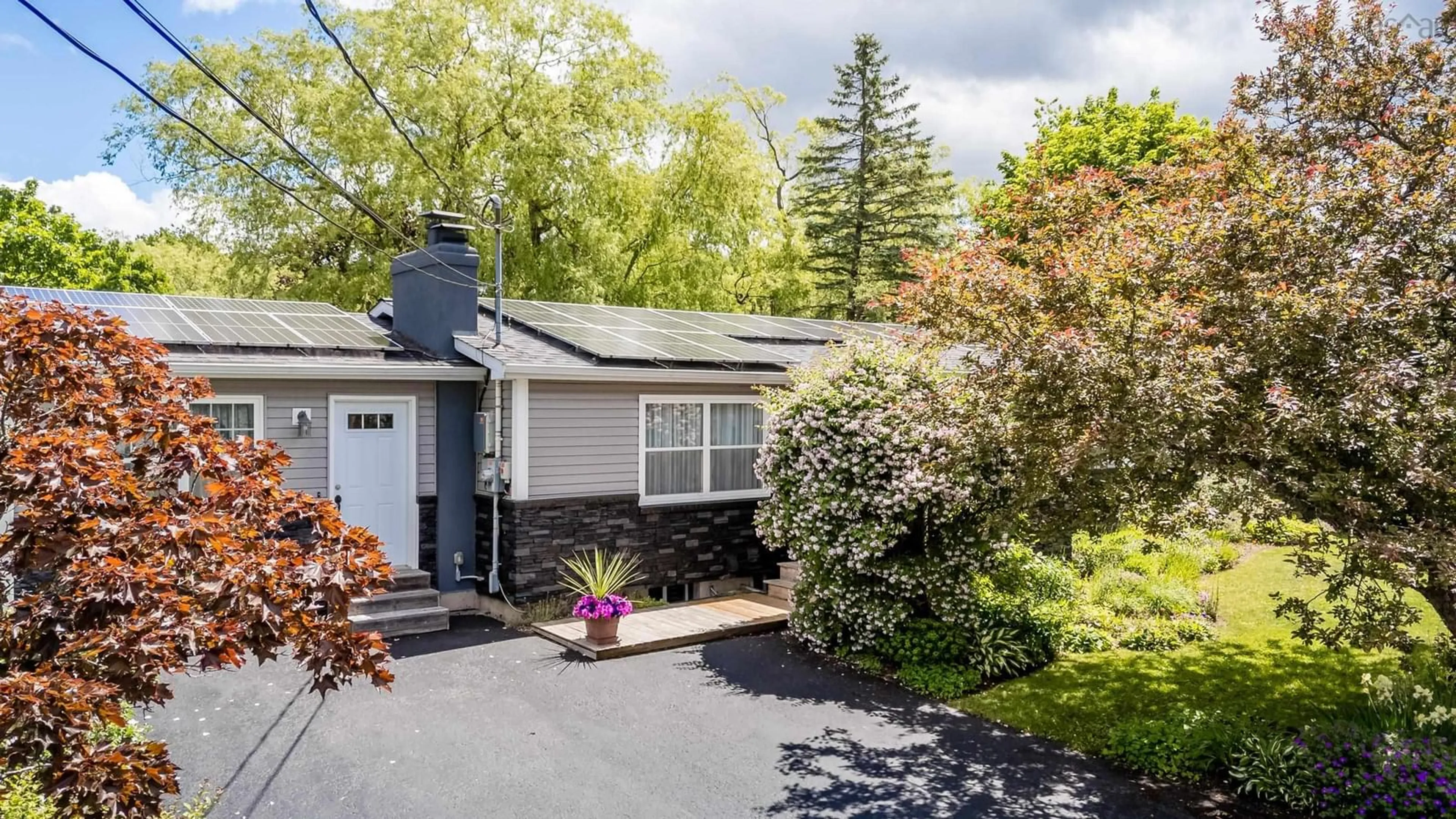 Home with vinyl exterior material, street for 15 Grandview Dr, Wolfville Nova Scotia B4P 1W5