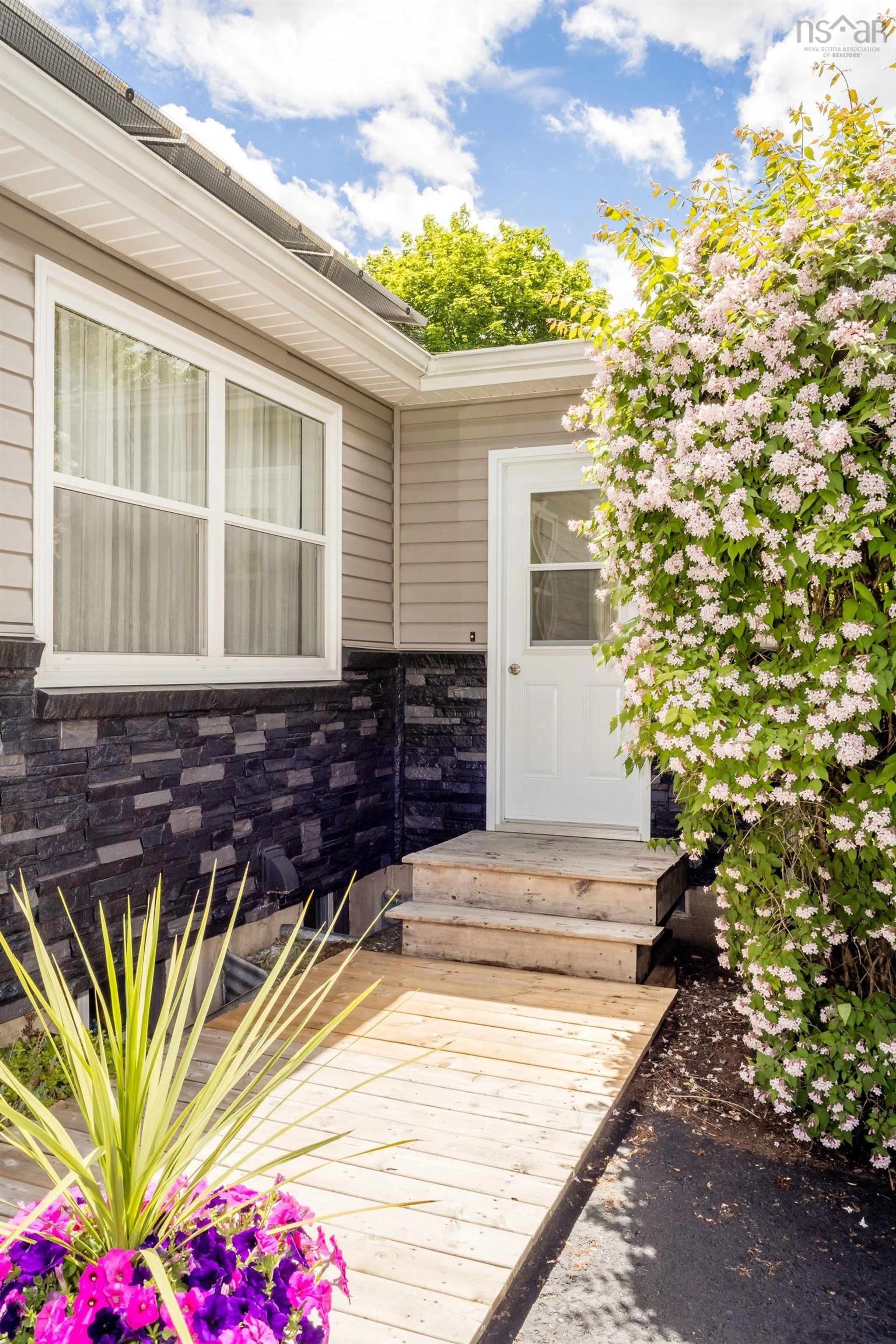 Home with vinyl exterior material, street for 15 Grandview Dr, Wolfville Nova Scotia B4P 1W5