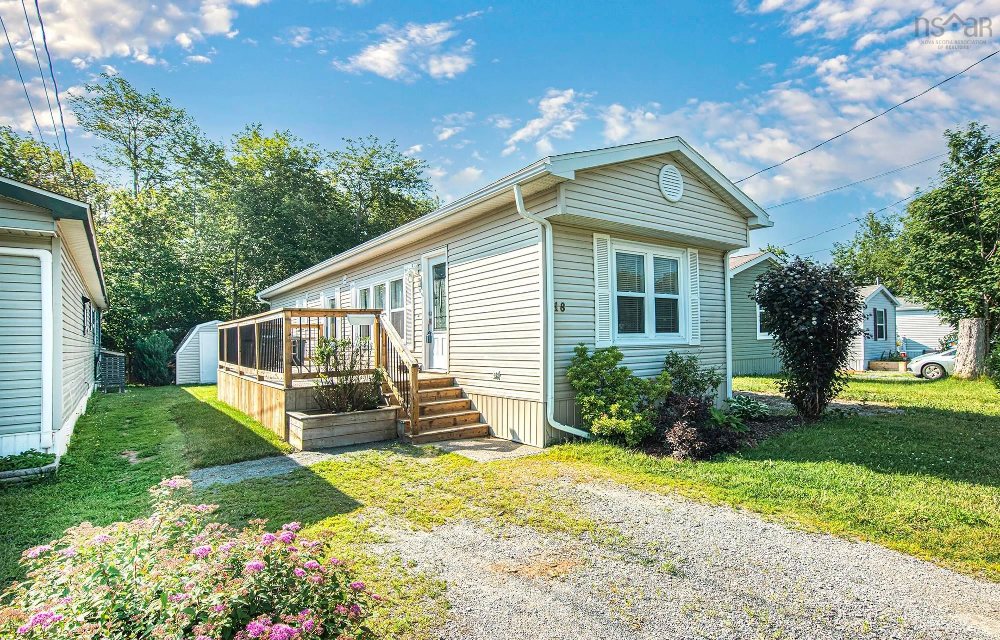 Home with vinyl exterior material, street for 18 Elcona Ave, Middle Sackville Nova Scotia B4E 3B2
