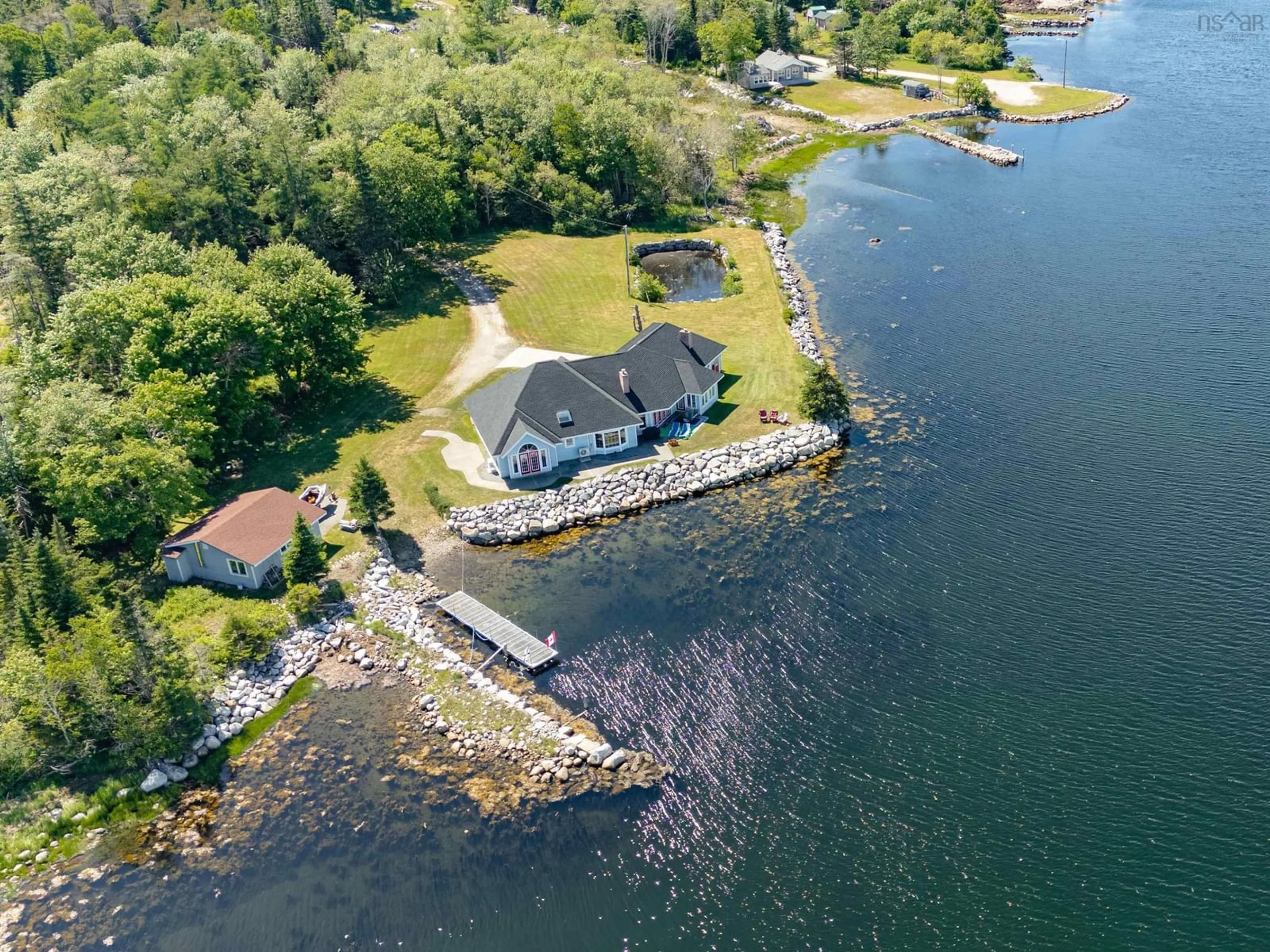 A pic from outside/outdoor area/front of a property/back of a property/a pic from drone, water/lake/river/ocean view for 195 Port Latour Rd, Port Clyde Nova Scotia B0W 2S0