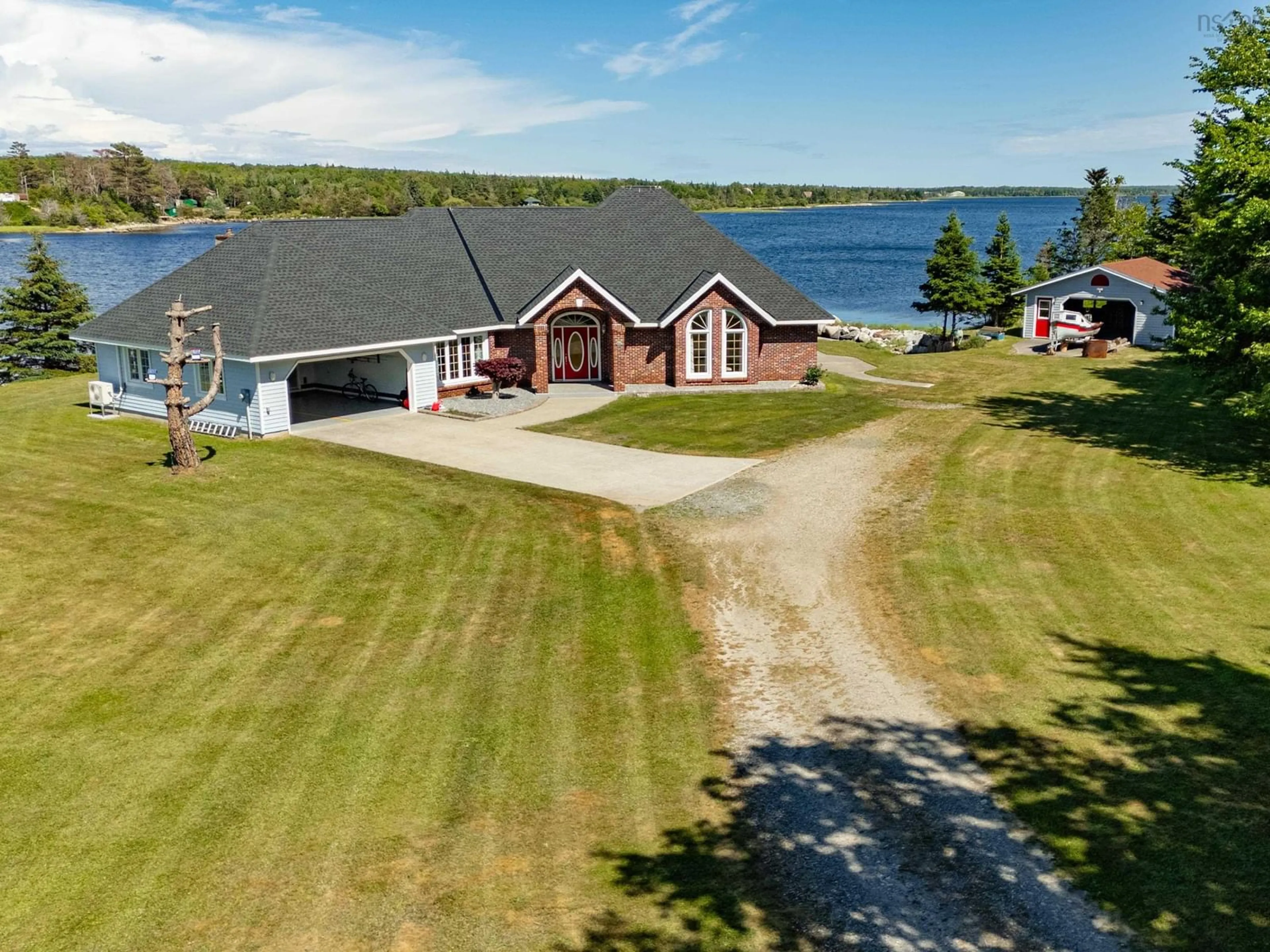 A pic from outside/outdoor area/front of a property/back of a property/a pic from drone, water/lake/river/ocean view for 195 Port Latour Rd, Port Clyde Nova Scotia B0W 2S0