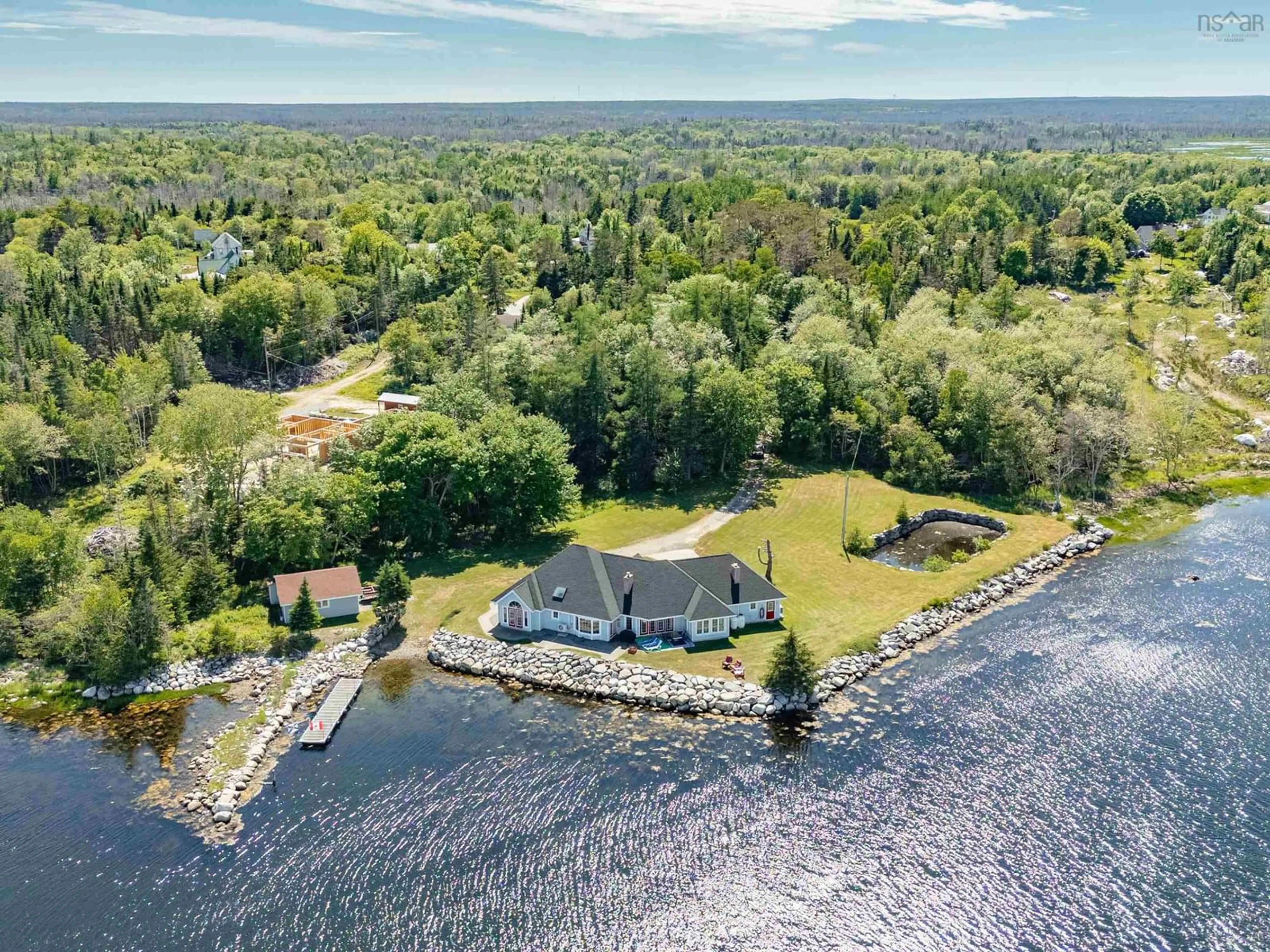 A pic from outside/outdoor area/front of a property/back of a property/a pic from drone, water/lake/river/ocean view for 195 Port Latour Rd, Port Clyde Nova Scotia B0W 2S0