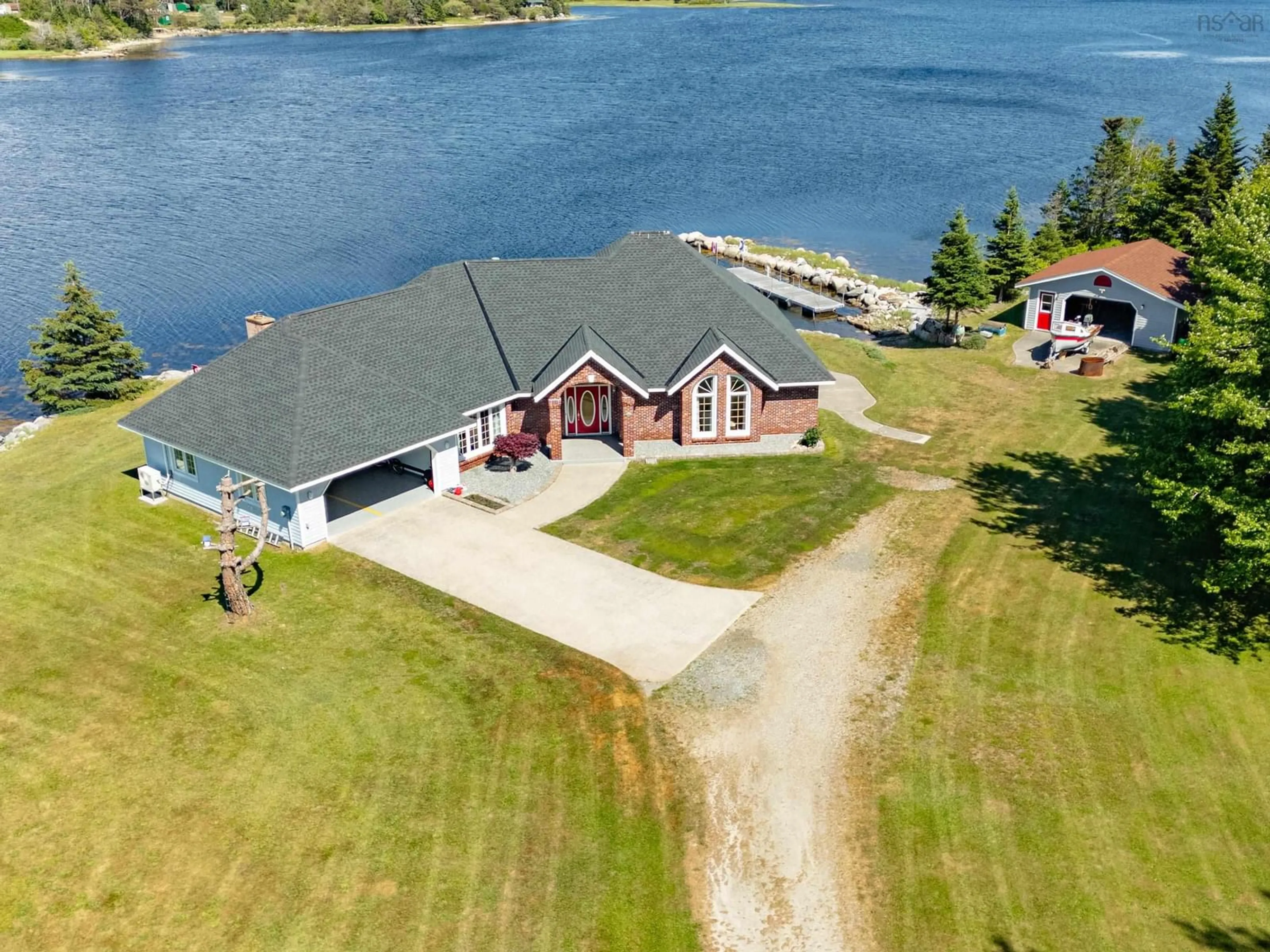 A pic from outside/outdoor area/front of a property/back of a property/a pic from drone, water/lake/river/ocean view for 195 Port Latour Rd, Port Clyde Nova Scotia B0W 2S0