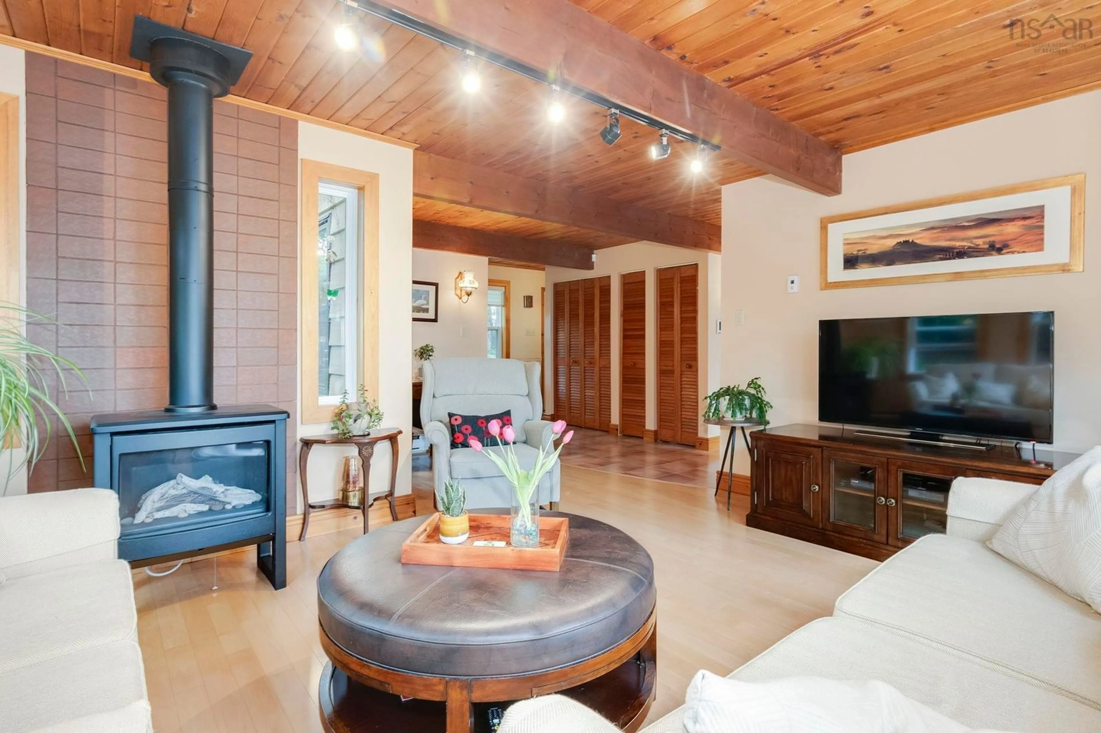 Living room with furniture, wood/laminate floor for 9 Lakewood Dr, Brookside Nova Scotia B3T 1S5