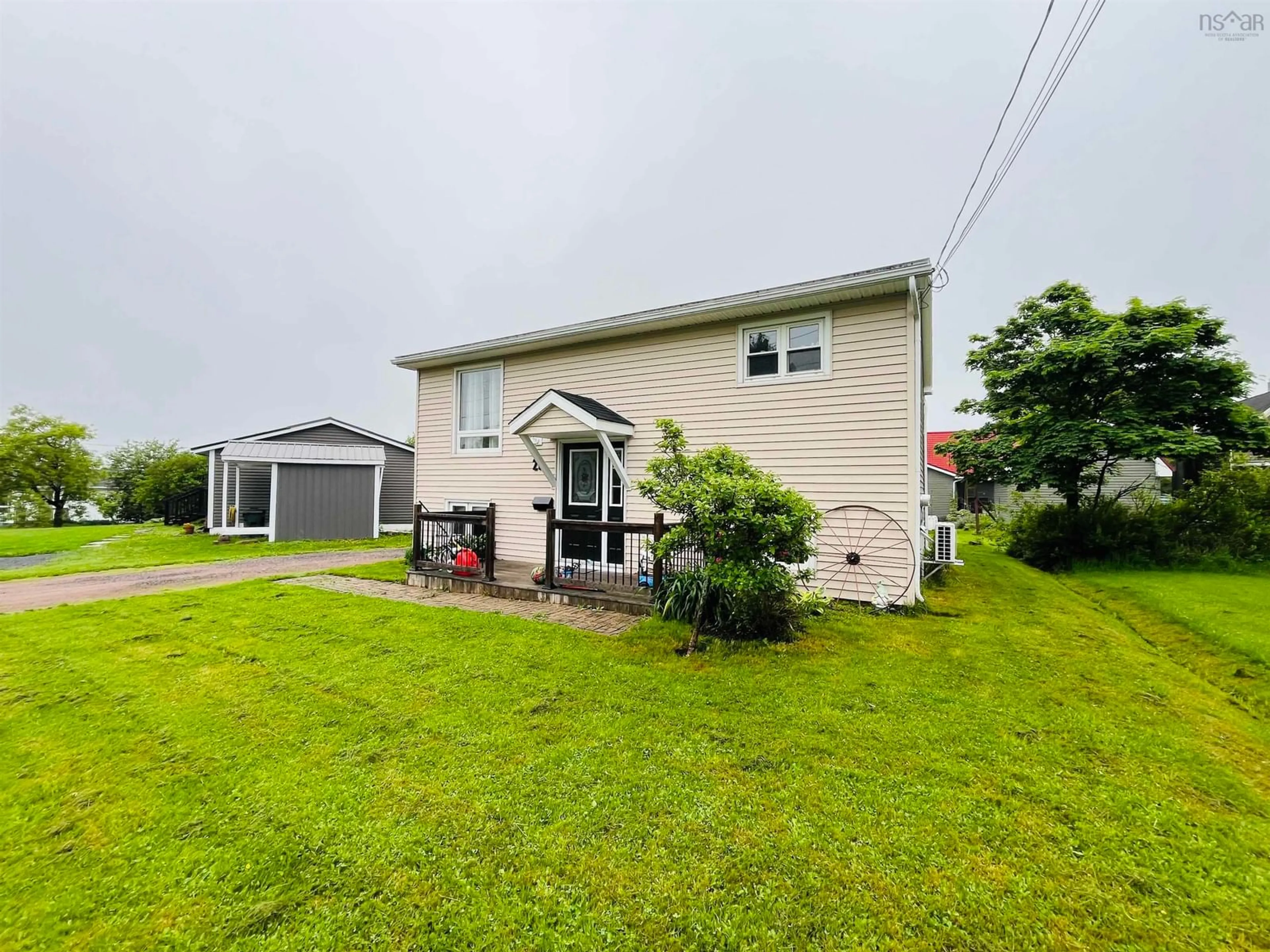 A pic from outside/outdoor area/front of a property/back of a property/a pic from drone, water/lake/river/ocean view for 21 Snowden Ave, Amherst Nova Scotia B4H 2N1