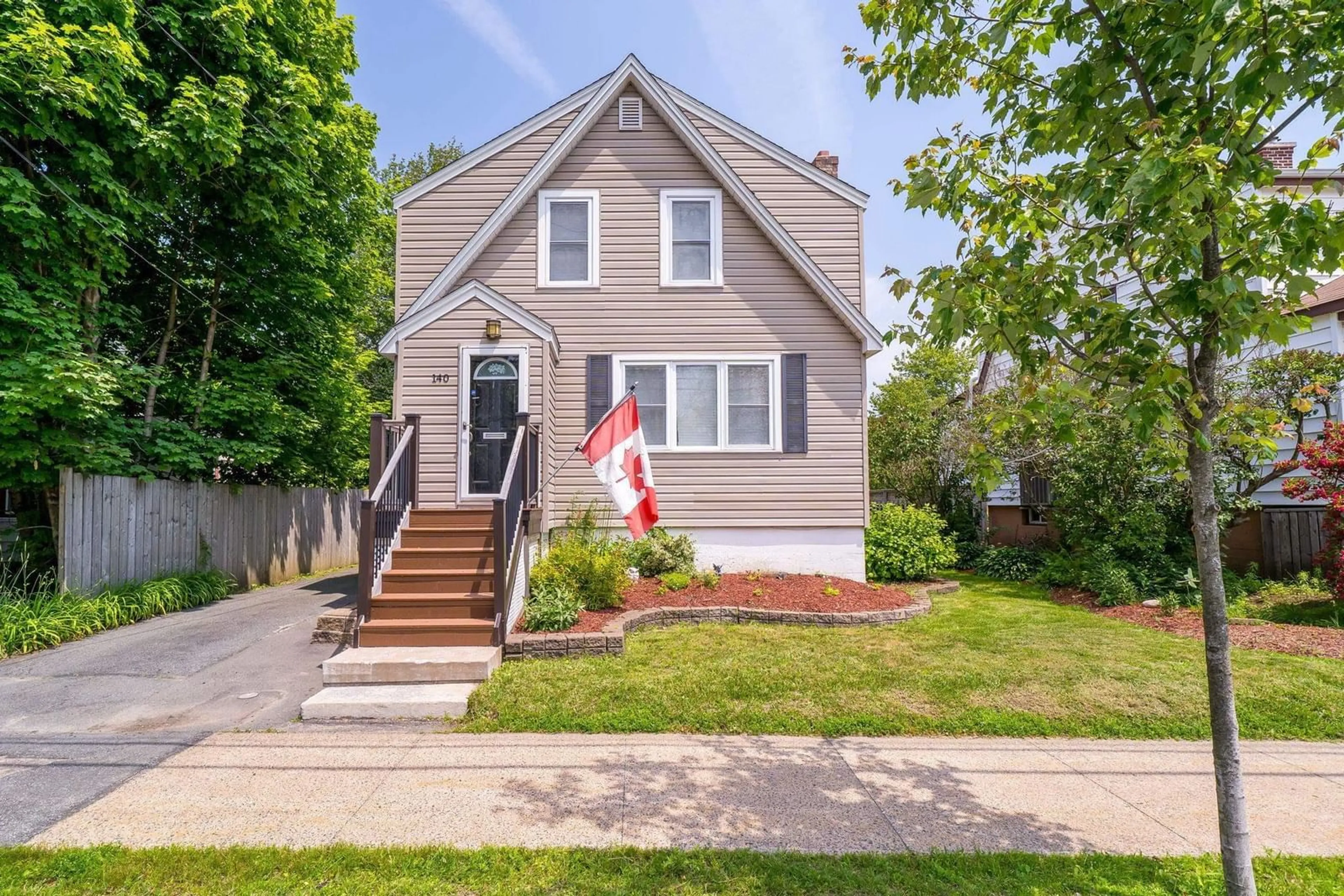Home with vinyl exterior material, street for 140 Victoria Rd, Dartmouth Nova Scotia B3A 1V7