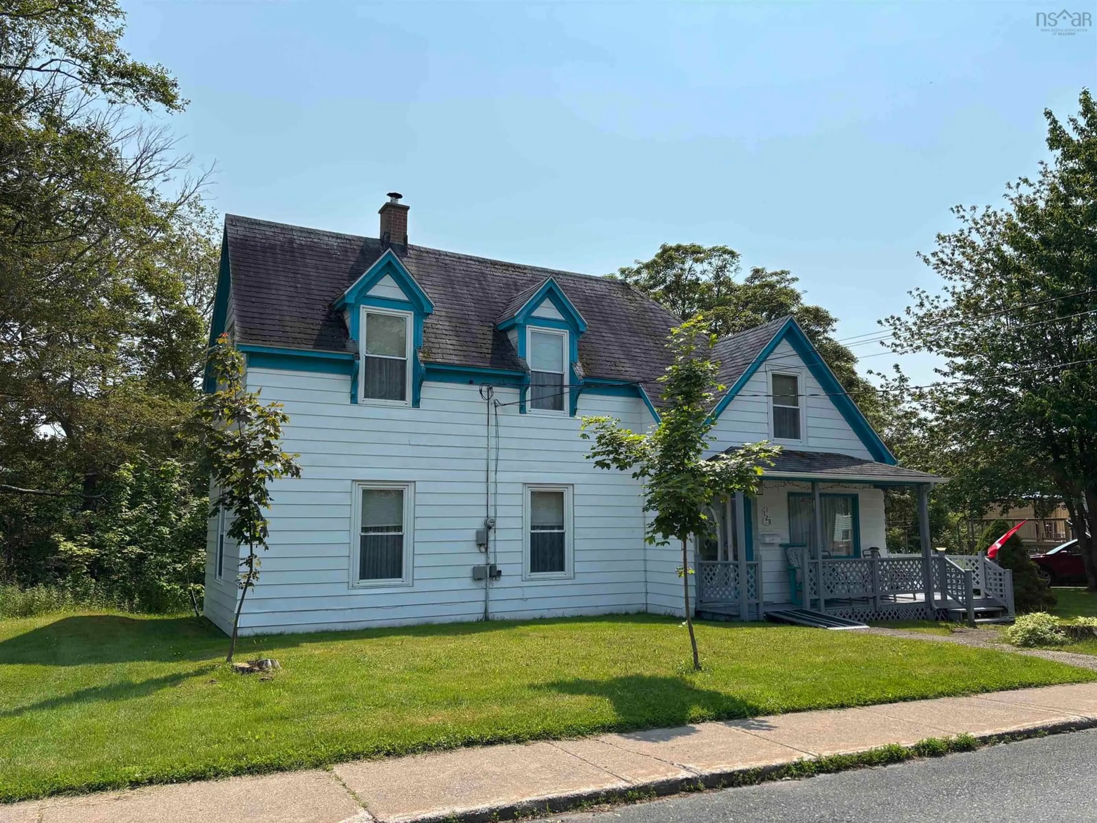 A pic from outside/outdoor area/front of a property/back of a property/a pic from drone, street for 128 Regent St., North Sydney Nova Scotia B2A 2G5