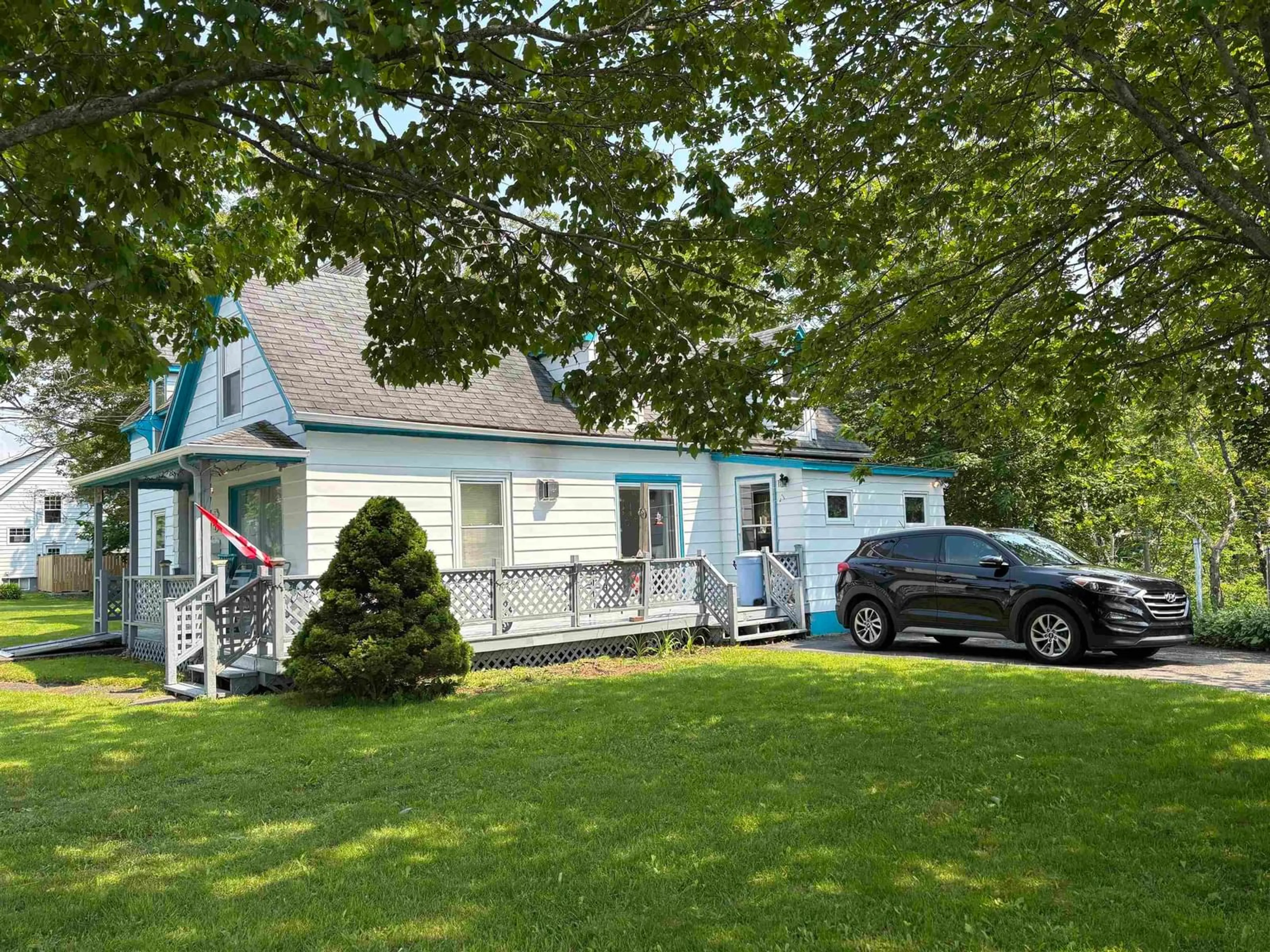 Home with vinyl exterior material, street for 128 Regent St., North Sydney Nova Scotia B2A 2G5