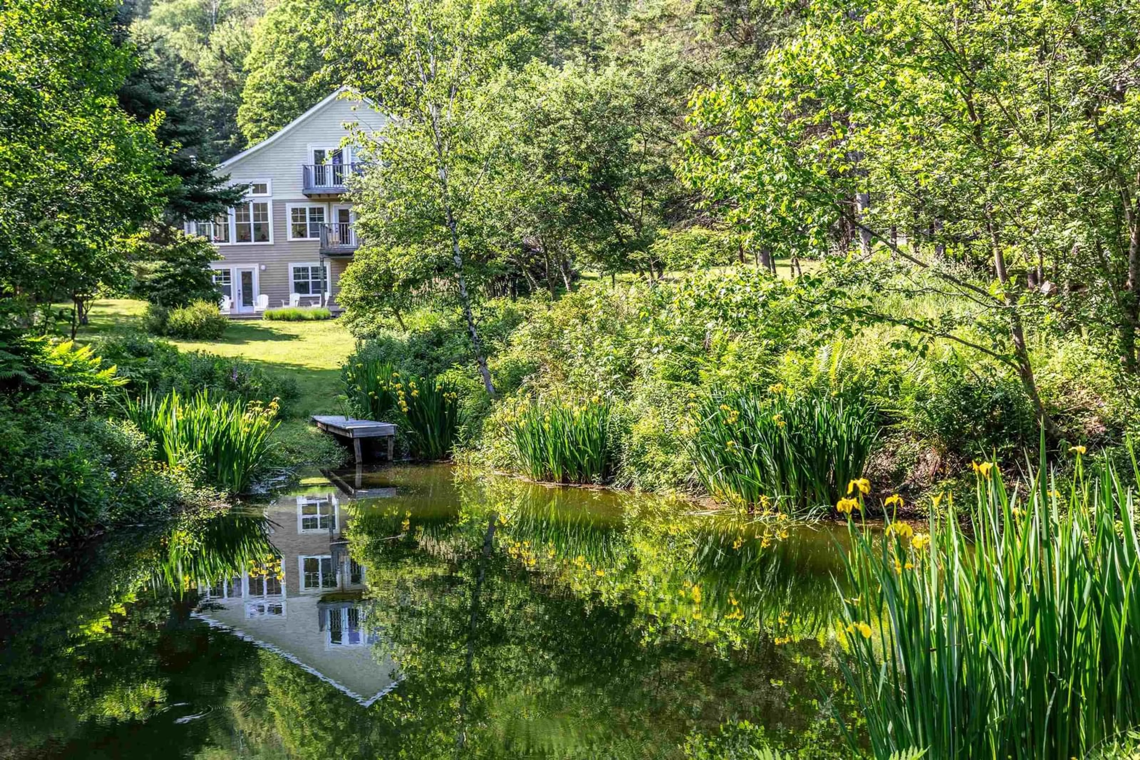 A pic from outside/outdoor area/front of a property/back of a property/a pic from drone, water/lake/river/ocean view for 7138 Highway 209, Port Greville Nova Scotia B0M 1S0