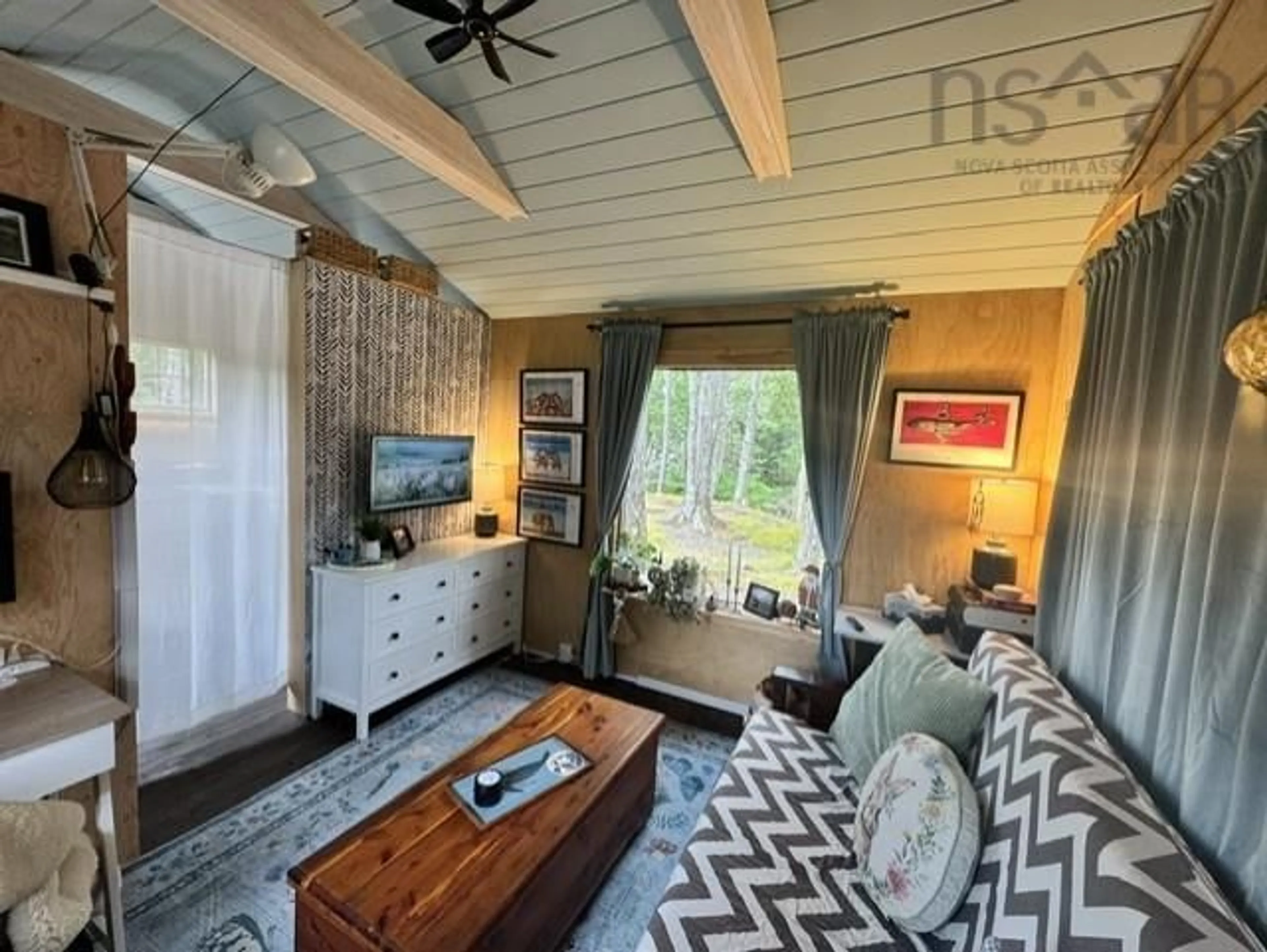 Living room with furniture, wood/laminate floor for 579 Highway 246, Wentworth Nova Scotia B0M 1Z0